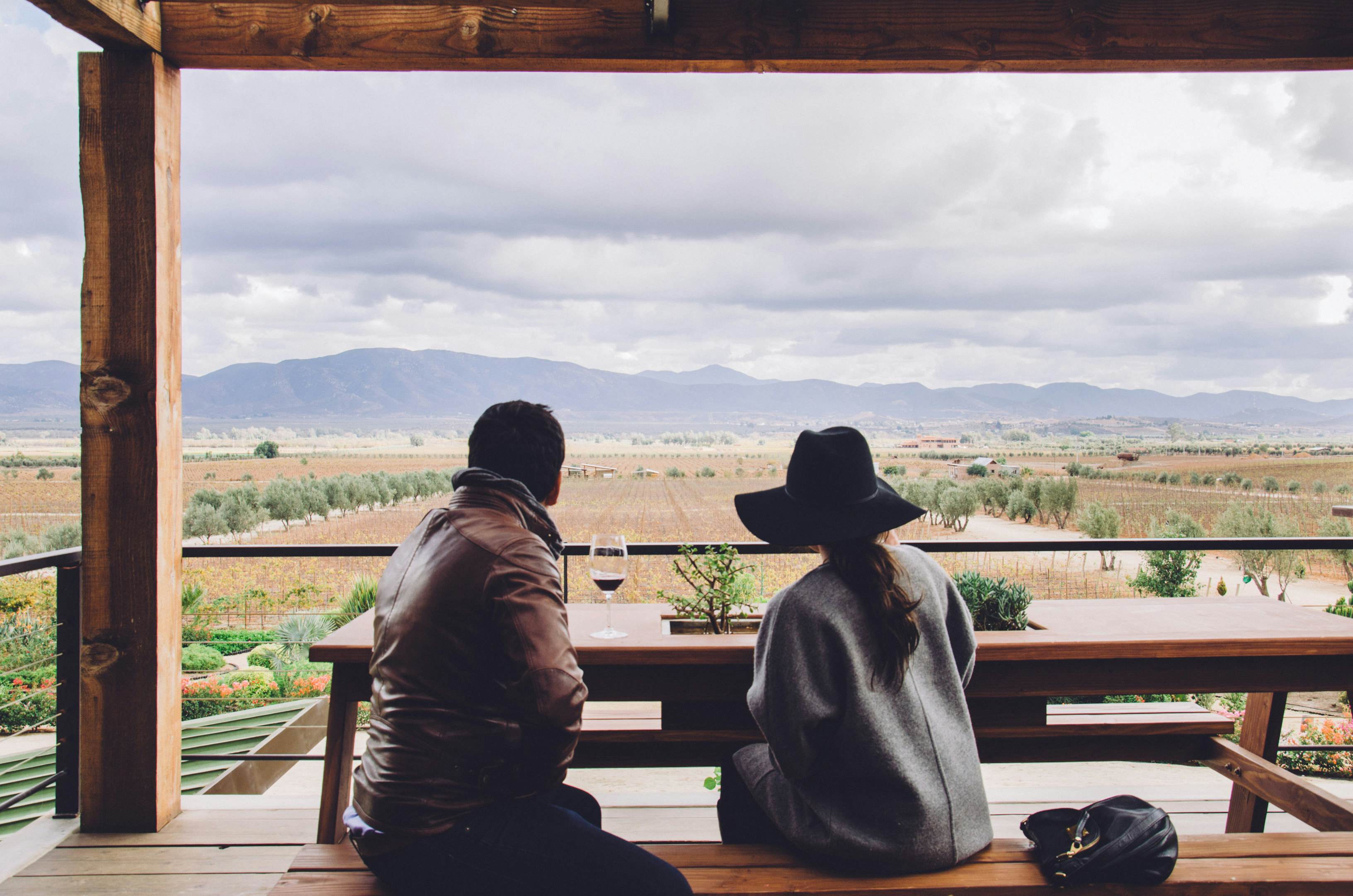 Rear view of friends sitting on bench in gazebo against landscape.
615314987
Photography, Cloud - Sky, Gazebo, valle de guadalupe, Three Quarter Length, Adult, Lifestyles, Rear View, Real Life, Men, Women, Friendship, Mountain, Horizontal, Wood - Material, Two People, Landscape, Hat, Bench, Sky, Color Image, Sitting, Adults Only, Real People, Latin America, Nature, Mountain Range, Day, Outdoors, Mexico, Looking At View, Scenics - Nature, Leisure Activity, Beauty In Nature, People