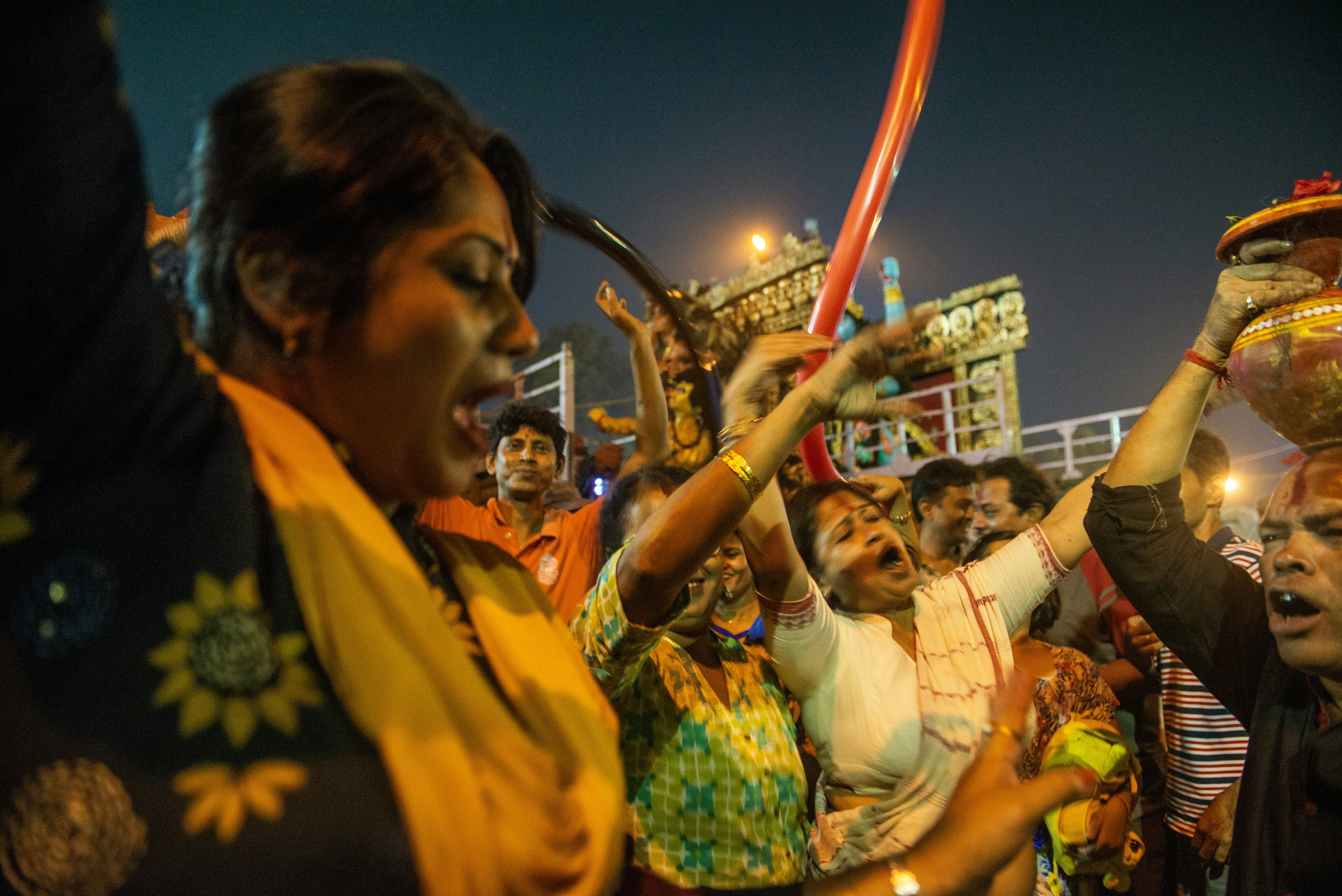 A group of people dancing and celebrating