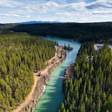 Miles Canyon, Yukon, Canada, is a breathtaking natural wonder. It is home to the majestic Yukon River and the iconic Robert Lowe Suspension Bridge License Type: media Download Time: 2023-12-12T16:58:22.000Z User: nic.dhoedt_lonelyplanet Is Editorial: No purchase_order: