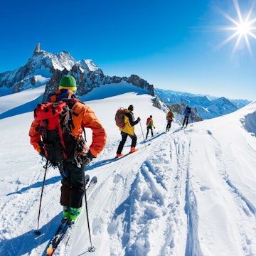 A group of skiers start the descent of Valle Blanche, the most famous offpist run in the Alps, Valle Blanche descent links Italy and France through the Mont Blanc Massif. Chamonix, France, Europe. License Type: media Download Time: 2024-02-02T18:58:08.000Z User: aniabartoszek Is Editorial: No purchase_order: