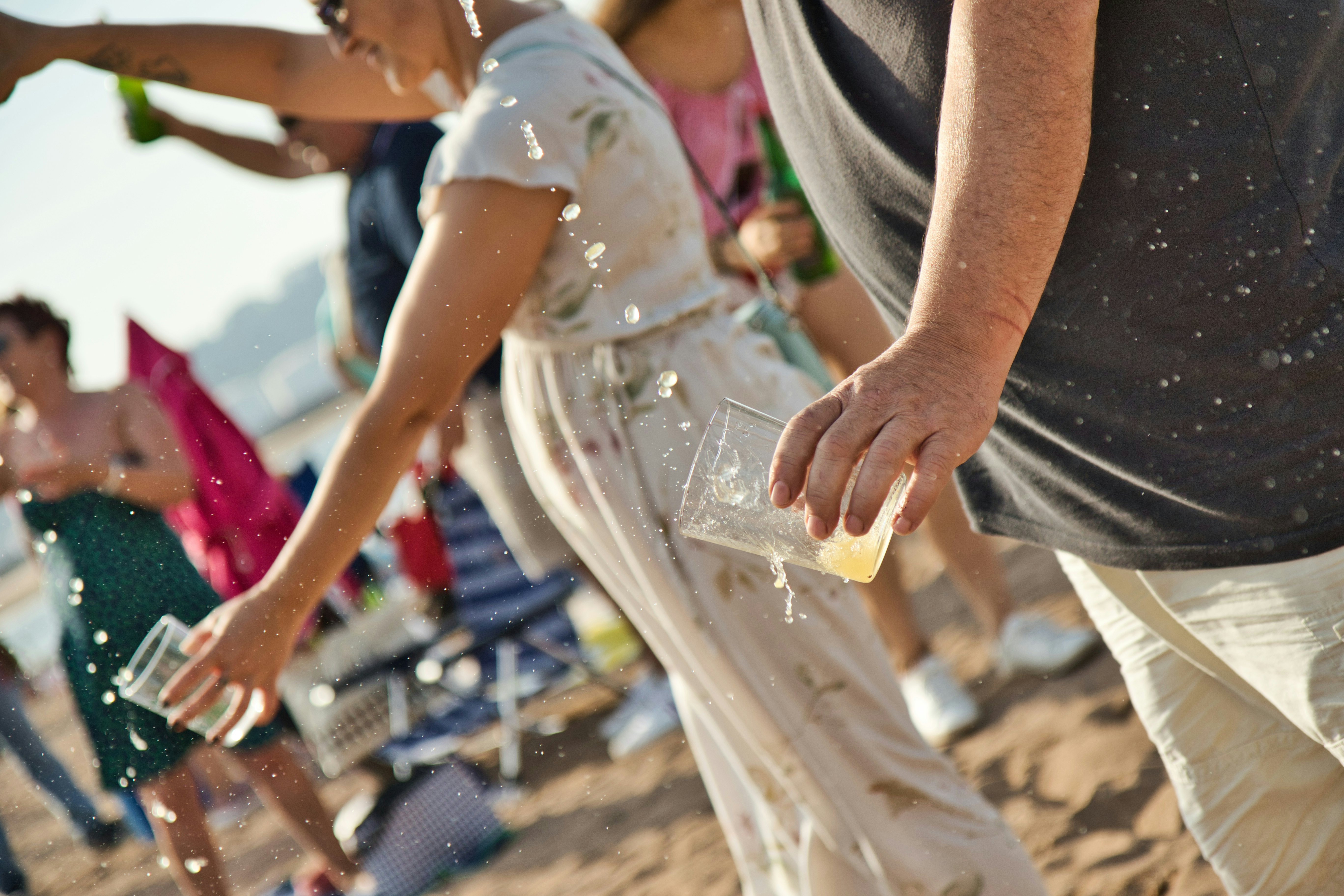 People pouring cider the traditional way at the Natural Cider Fest in Gijón, Asturias, where 9721 persons beat the former record of persons 'escanciando' (pouring cider in a glass) simultaneously.