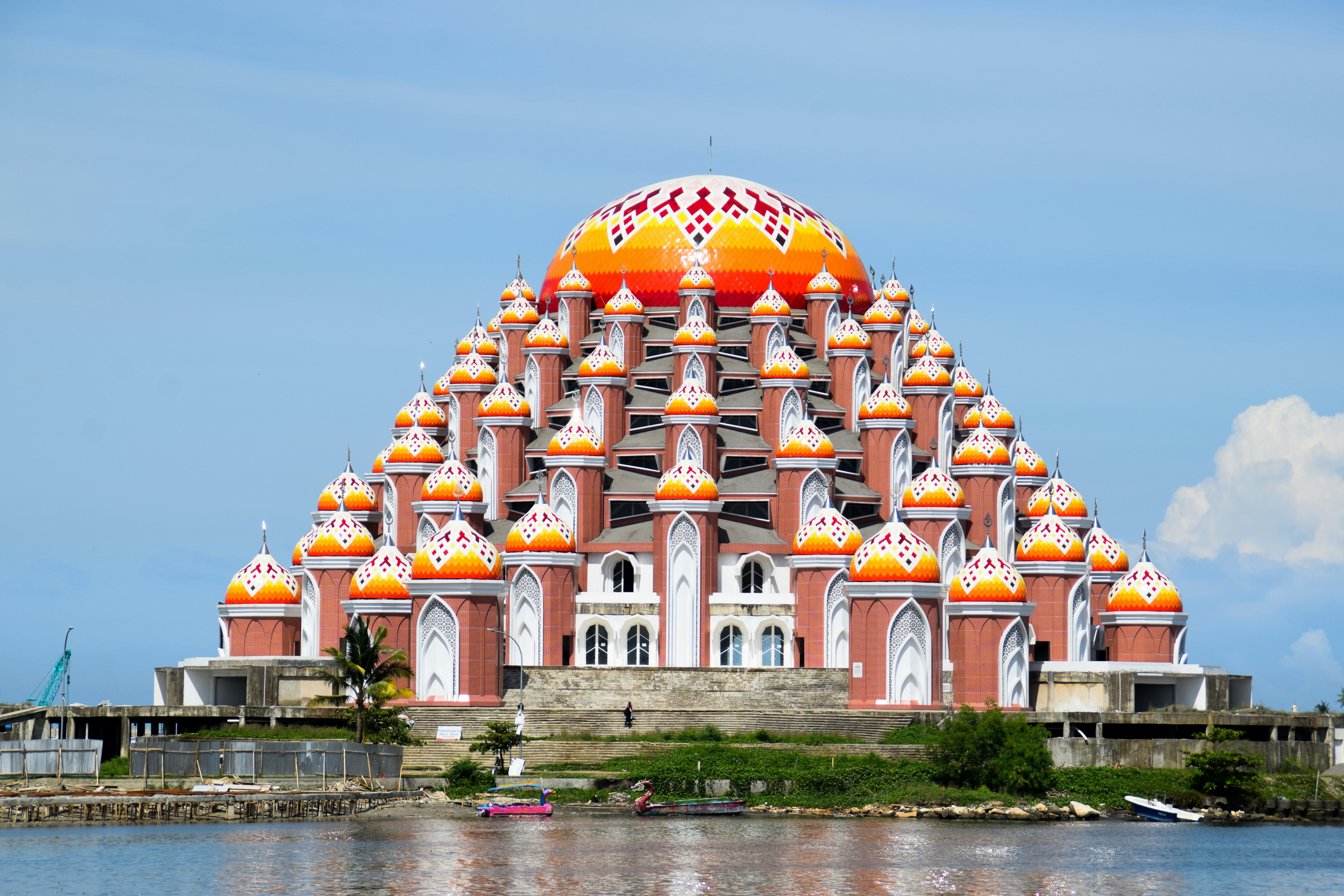 The colorful domes of the Asmaul Husnah 99 Kubah mosque in Makassar, Indonesia.