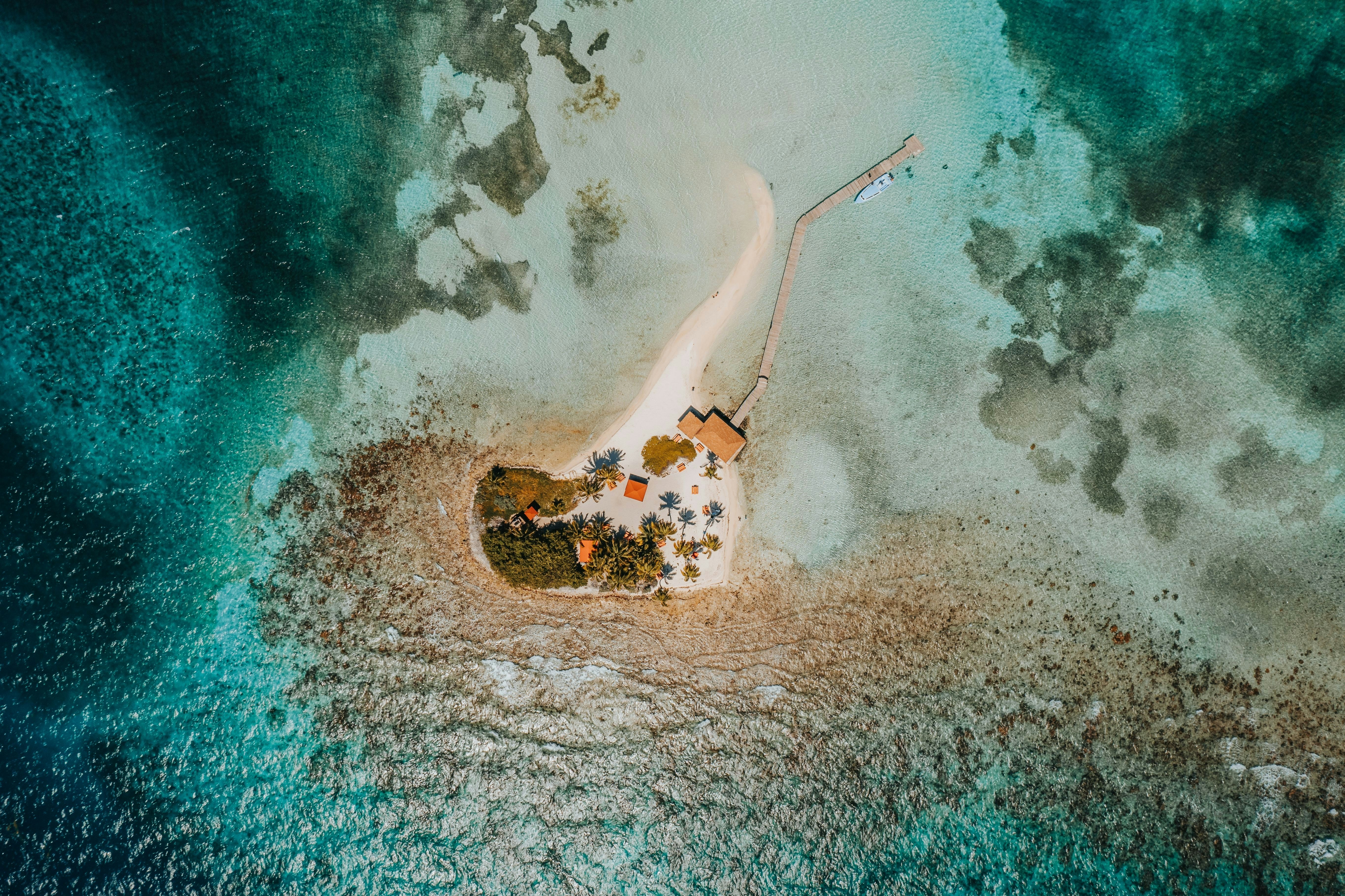 Aerial view of a small island surrounded by ocean.