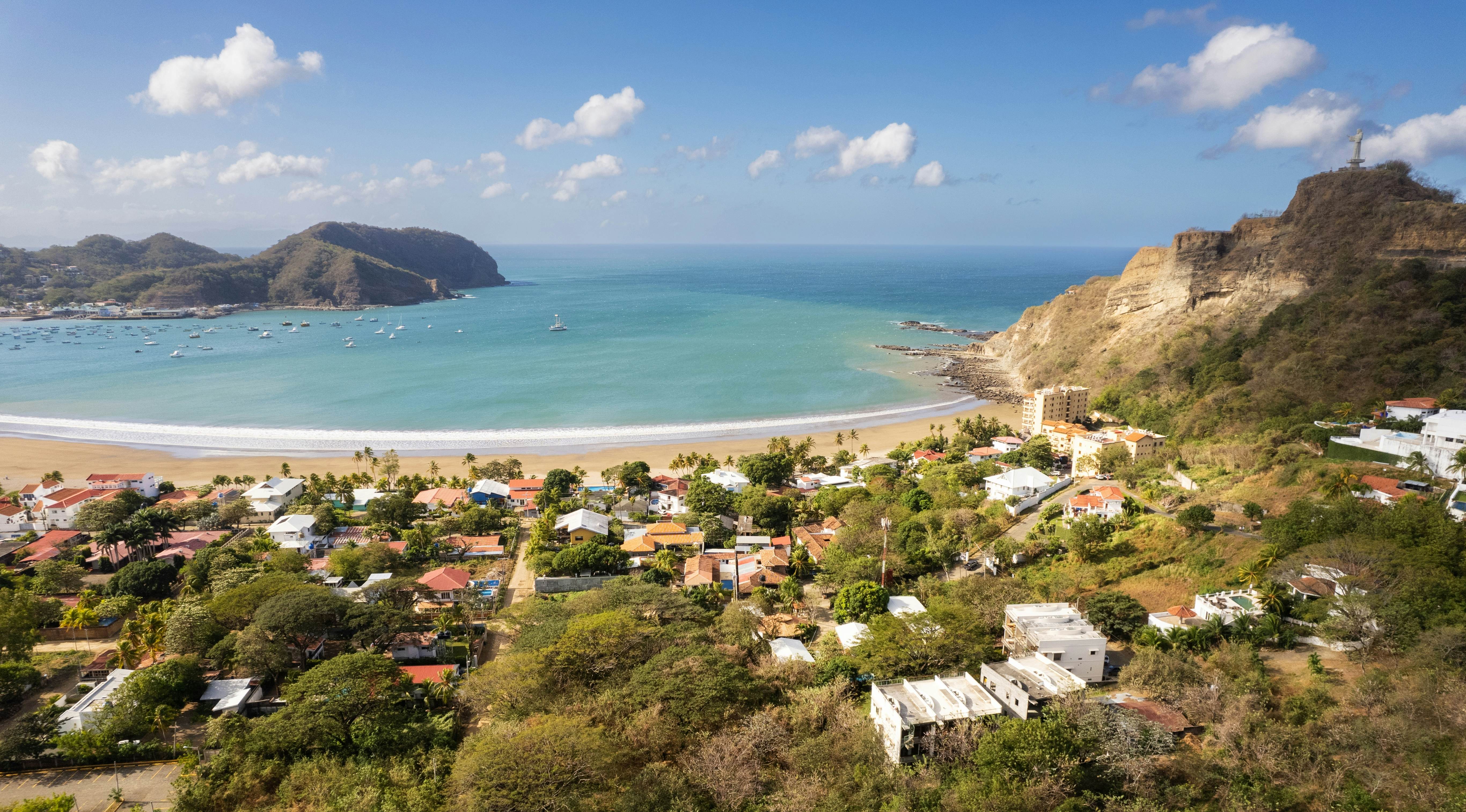 Bay with blue water in Nicaragua San Juan Del Sur aerial drone view on golden time of sunrise; Shutterstock ID 2341825871; purchase_order:65050 - Digital Destinations and Articles; job:Editorial; client:Top things San Juan del Sur; other:Alison Gonner
2341825871