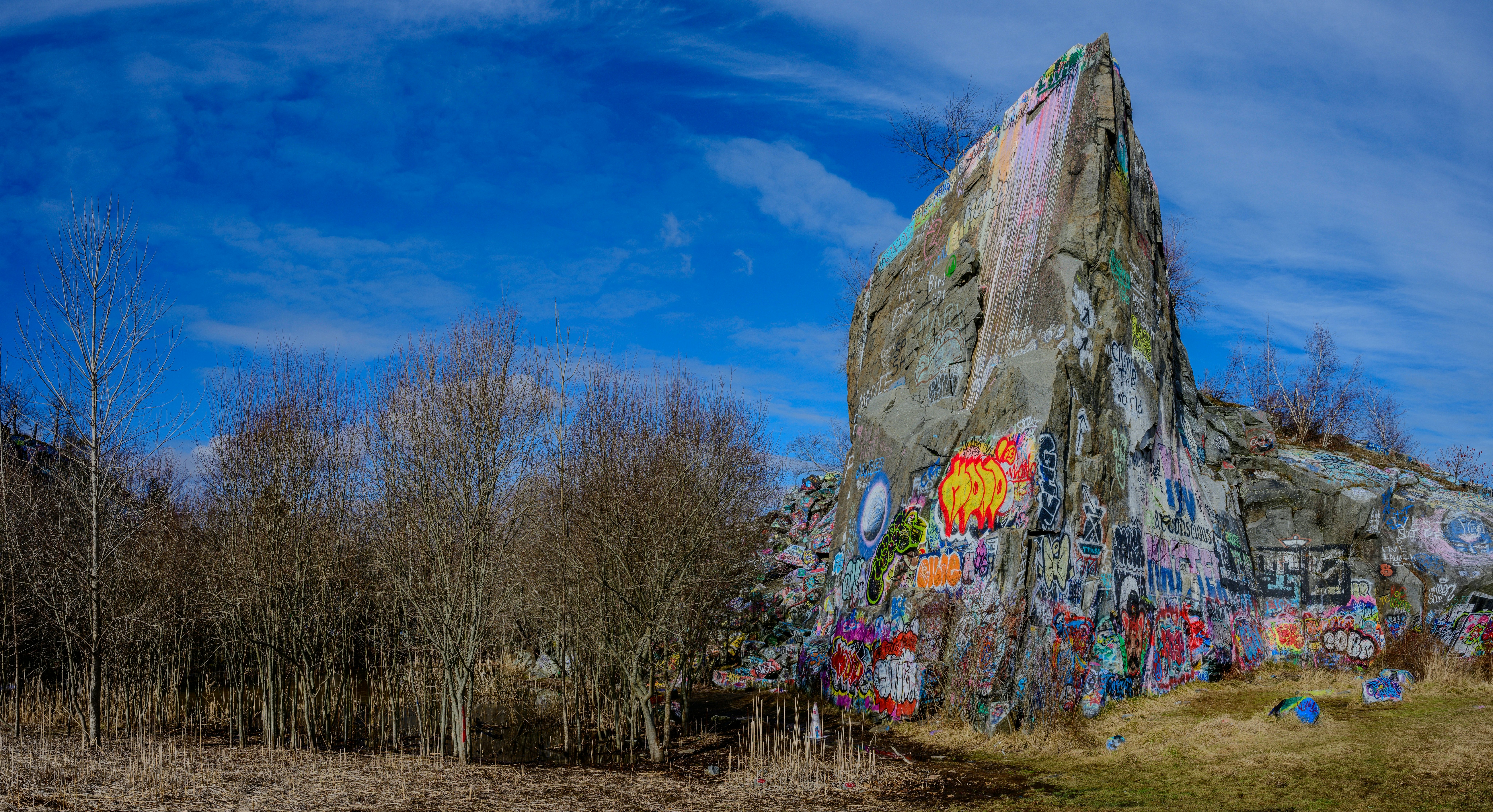 The now inactive Quincy Quarries, known for producing granite for over a century, have been reclaimed by the city and repurposed as a public green space