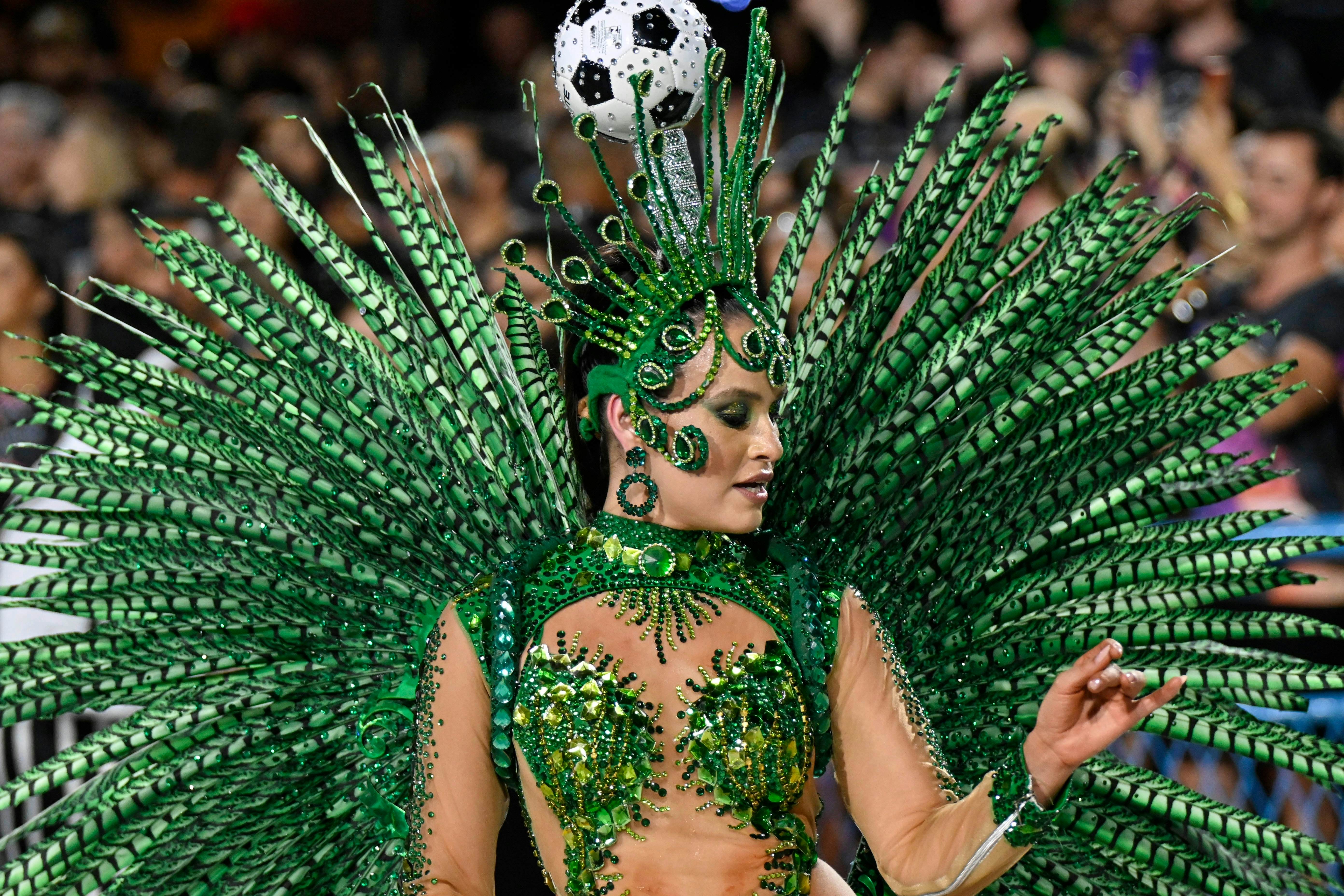 Rio, Brazil - February 28, 2025: Parades of the samba schools Botafogo of the gold group, during the carnival in the city of Rio de Janeiro in Sapucai street, License Type: media, Download Time: 2025-05-28T09:44:50.000Z, User: lonelyplanetmedia, Editorial: true, purchase_order: 65050 - Digital Destinations and Articles, job: Global Publishing WIP, client: Global Publishing WIP, other: Peterson Haggarty // SS Comp Ingestion