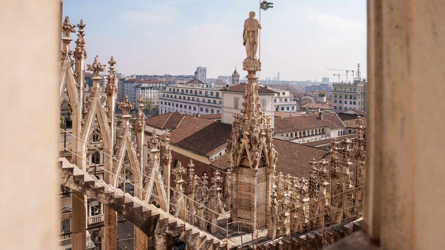 Milan, Italy - 19.03.2024: Stunning view of milan cathedral architecture with cityscape background, Milan Duomo Cathedral., License Type: media, Download Time: 2025-10-24T14:37:30.000Z, User: sashabrady26, Editorial: true, purchase_order: 65050 - Digital Destinations and Articles, job: Lonely Planet, client: Top things to do in Milan, other: Sasha Brady