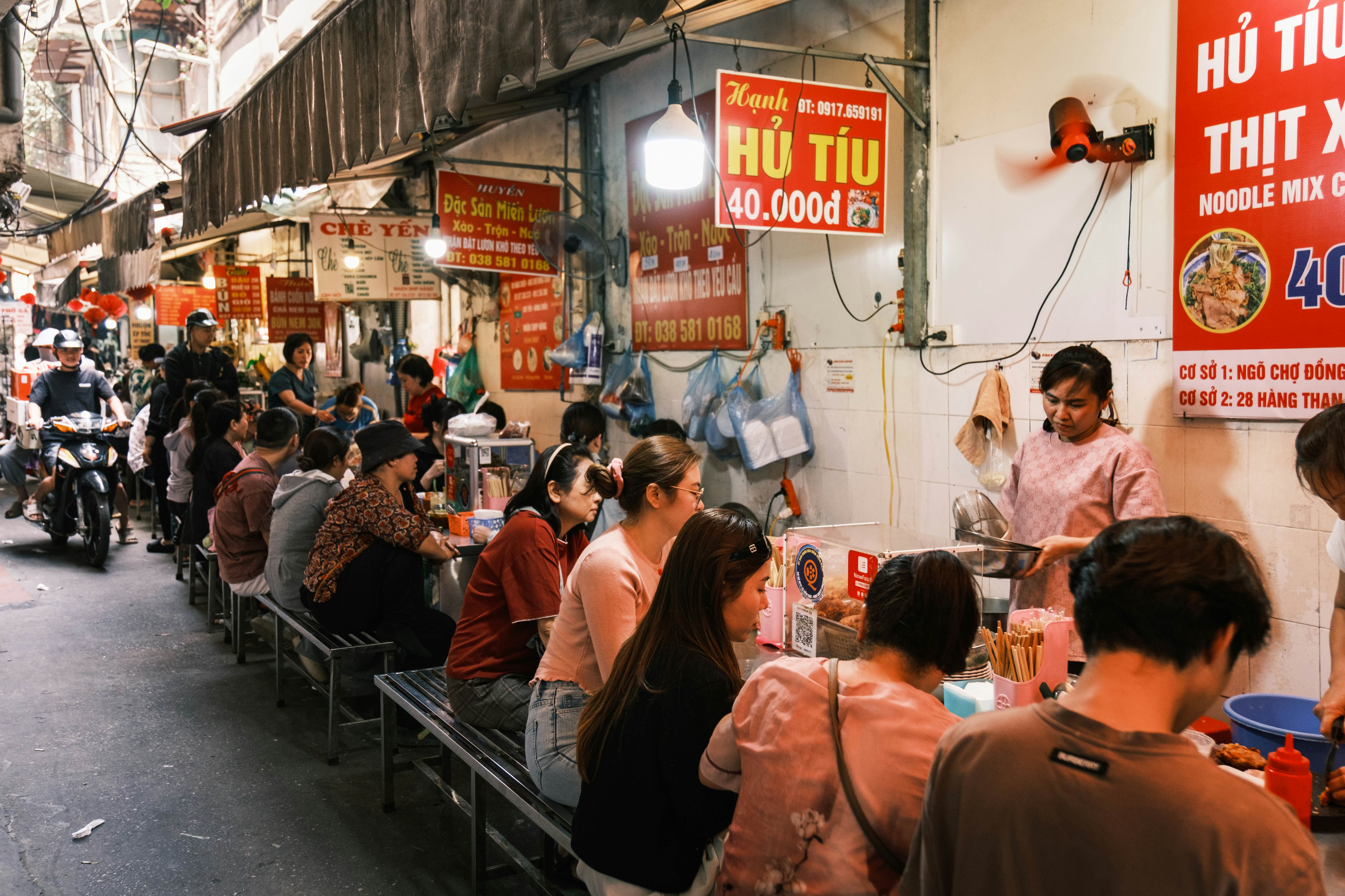 HANOI, VIETNAM — April 2025
Street food stalls, Hanoi