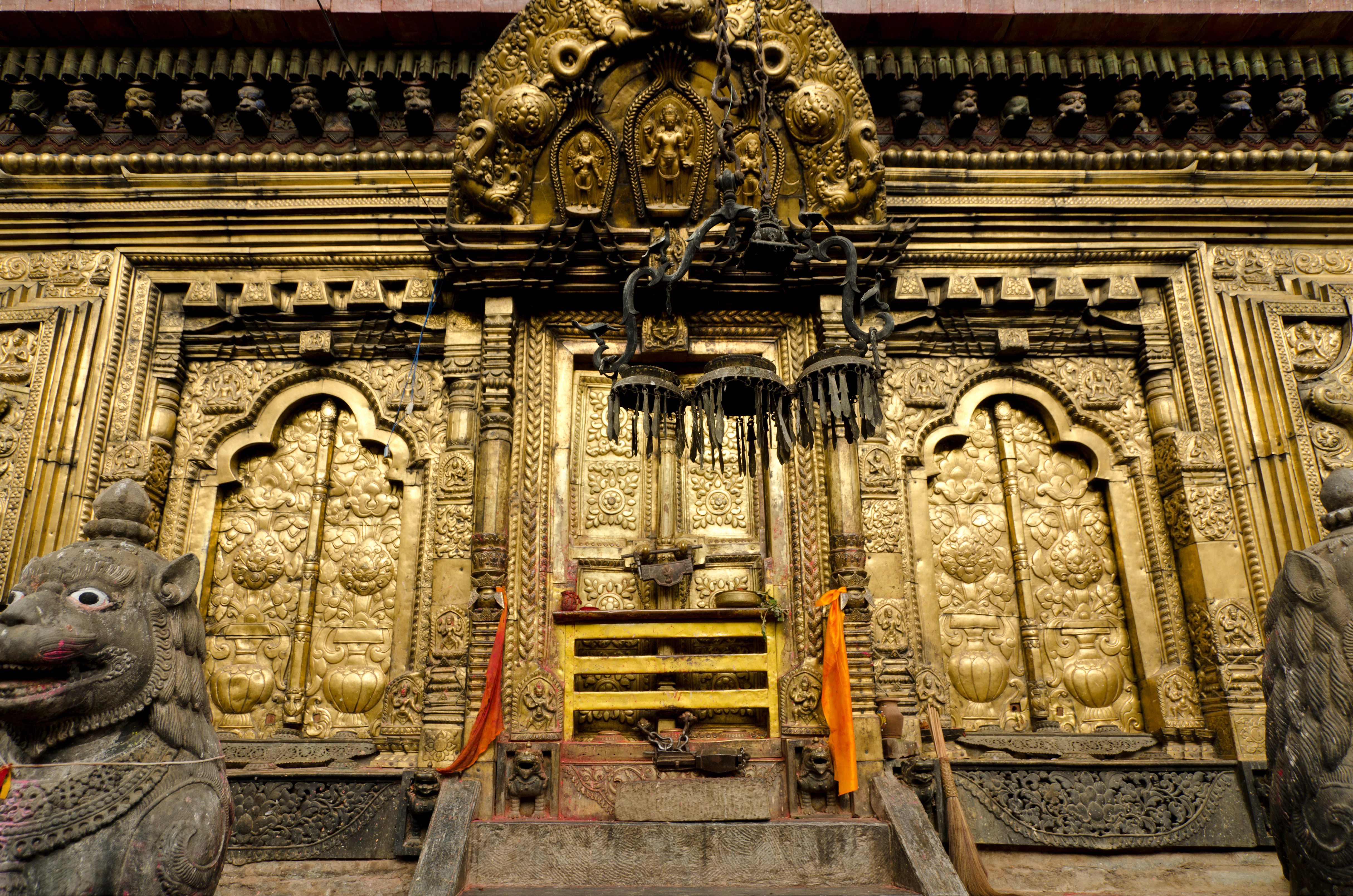 A gold plated metal door of a temple
