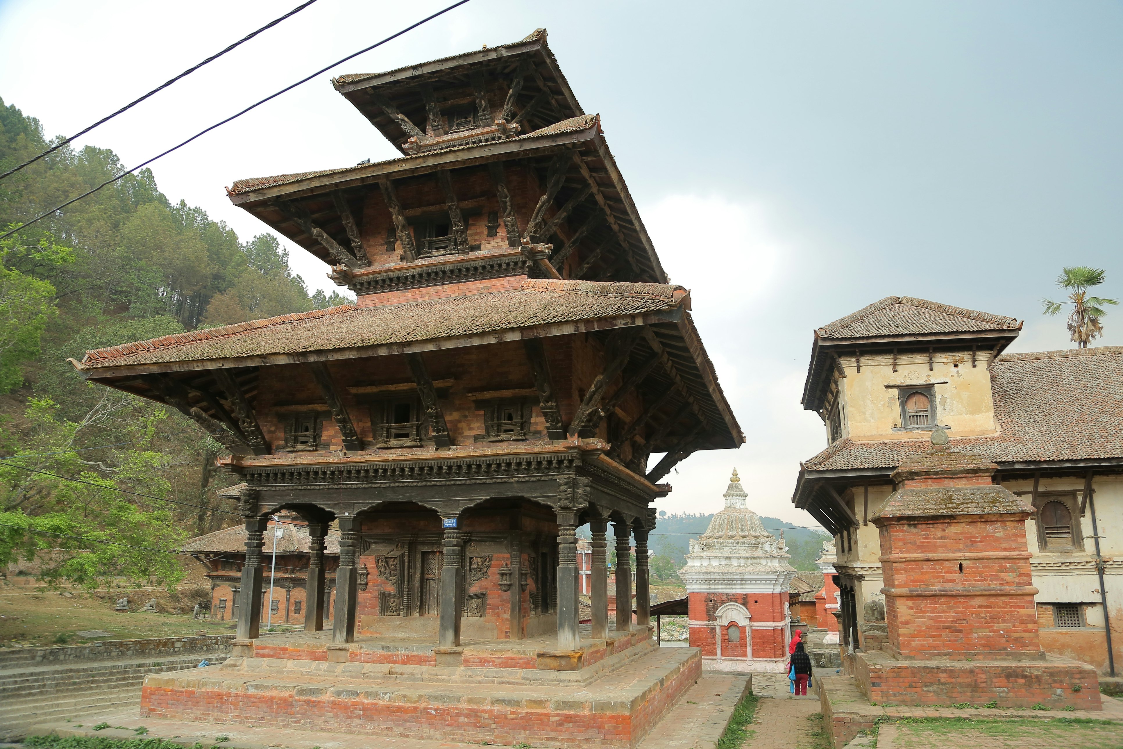 a sacred temple with mountains in the background