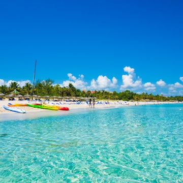 The beautiful beach of Varadero in Cuba with colorful boats and thatched umbrellas (image taken from the sea), License Type: media, Download Time: 2025-07-17T13:58:59.000Z, User: nic.dhoedt_lonelyplanet, Editorial: false, purchase_order: 56530 - Guidebooks, job: Global Publishing WIP, client: Lonely Planet / Cuba 12, other: Nicolas D'Hoedt