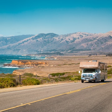 Panorama view of recreational vehicle driving on famous Highway 1 along the beautiful Central Coast of California, Big Sur, USA, License Type: media, Download Time: 2025-11-11T18:39:06.000Z, User: meg3348277, Editorial: false, purchase_order: 56530 - Guidebooks, job: Global Publishing-WIP, client: Lonely Planet 'Journey - Pacific Coast Highway 1', other: Megan Cassidy