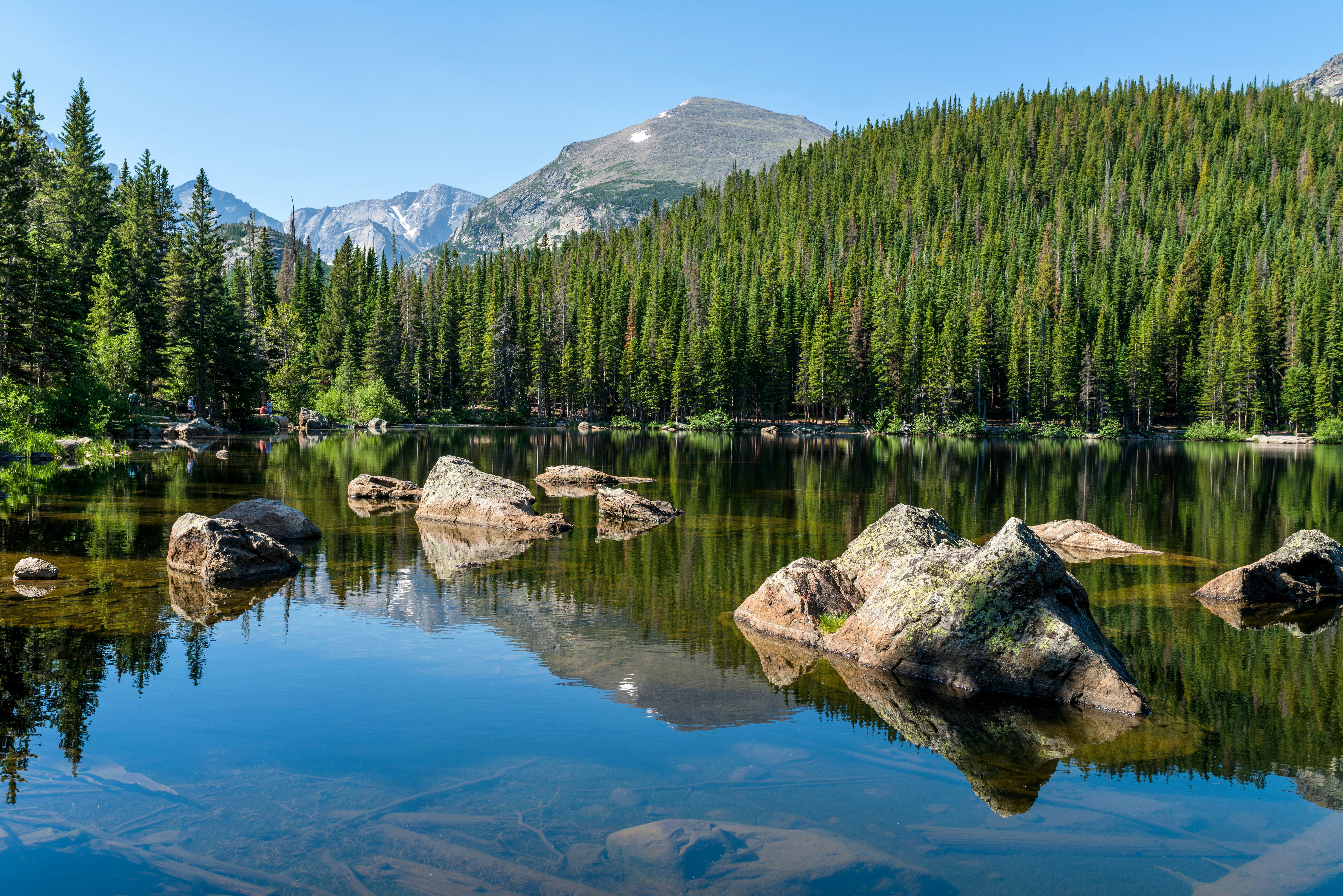 Bear Lake - A sunny summer morning view of a rocky section of Bear Lake, Rocky Mountain National Park, Colorado, USA., License Type: media, Download Time: 2025-09-16T11:45:14.000Z, User: comptonsheldon109, Editorial: false, purchase_order: 56530 - Guidebooks, job: Global Publishing WIP, client: American Rockies 4, other: Compton Sheldon