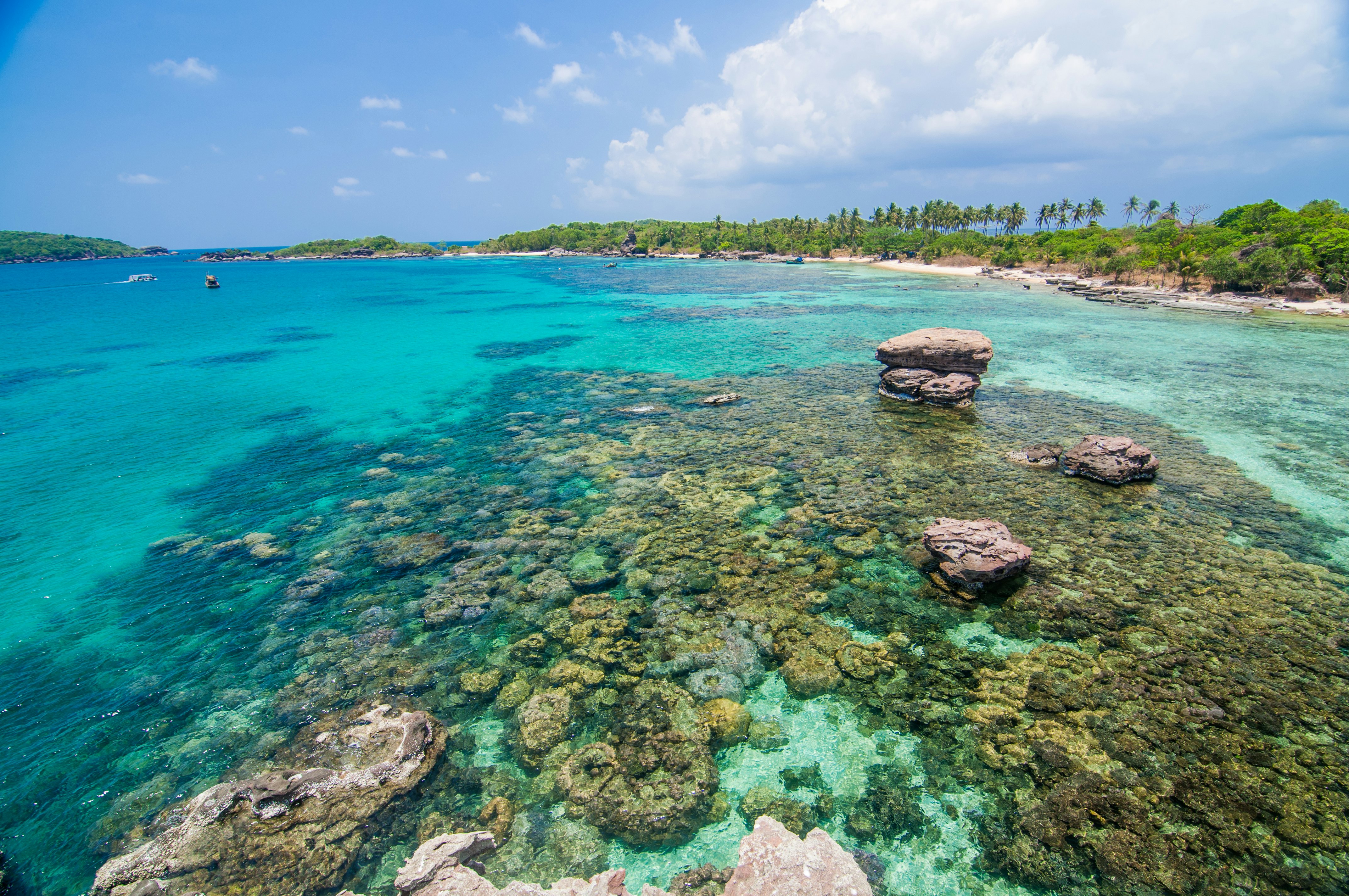 rocks and turquoise waters near an island