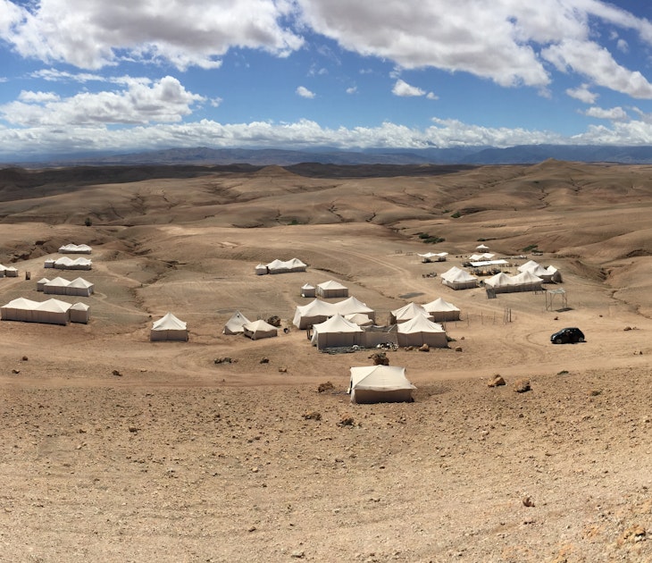 Panoramic view of desert glamping site, Agafay Desert, Morocco, License Type: media, Download Time: 2025-06-13T06:42:50.000Z, User: claramonitto, Editorial: false, purchase_order: 56530 - Guidebooks, job: Global Publishing-WIP, client: Pocket Marrakesh 7, other: Clara Monitto