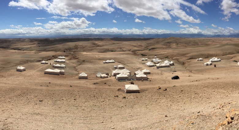 Panoramic view of desert glamping site, Agafay Desert, Morocco, License Type: media, Download Time: 2025-06-13T06:42:50.000Z, User: claramonitto, Editorial: false, purchase_order: 56530 - Guidebooks, job: Global Publishing-WIP, client: Pocket Marrakesh 7, other: Clara Monitto