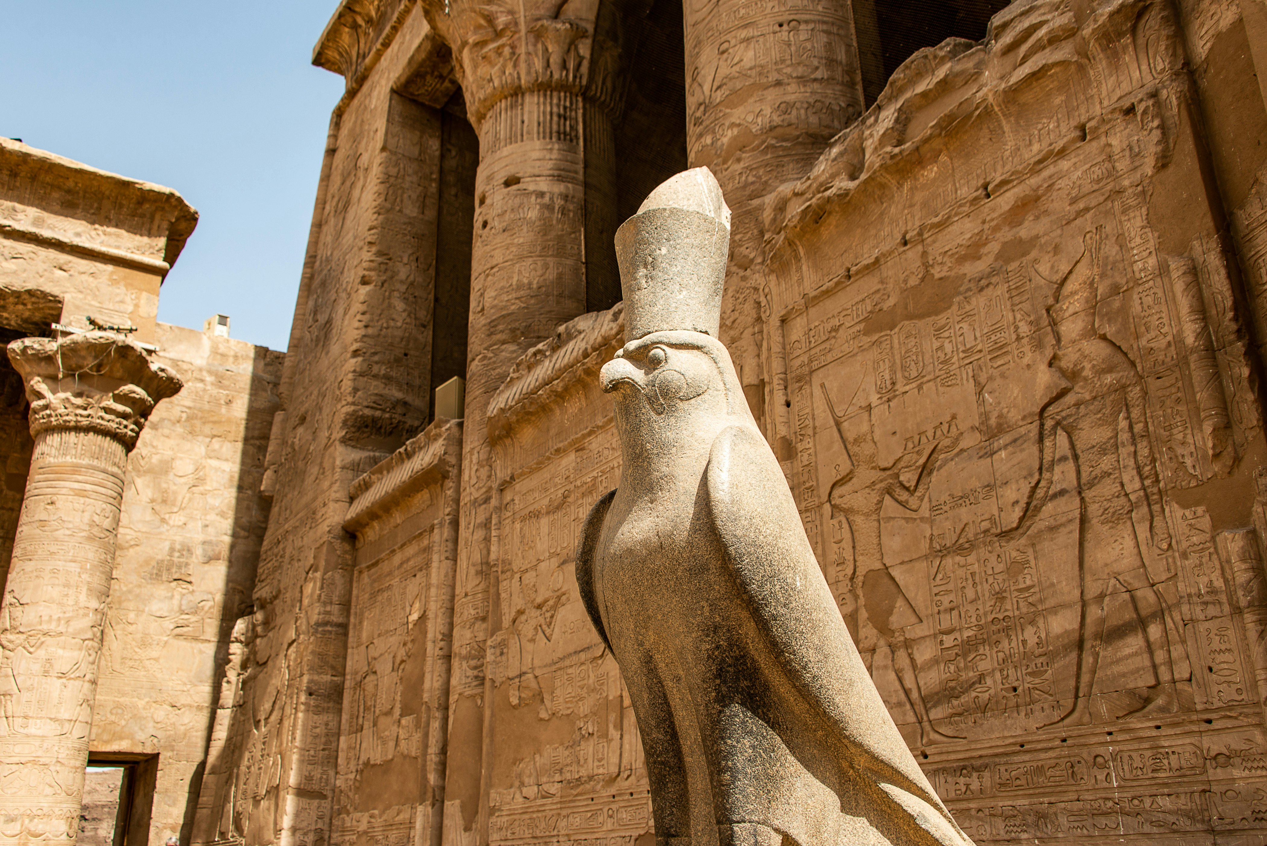 Carvings, statues and heiroglyphs at the Temple of Horus in Edfu, Egypt.