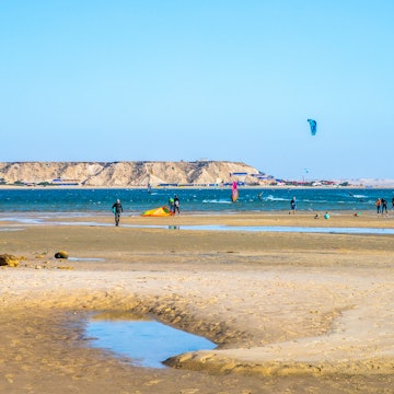 DAKHLA, MOROCCO, JAN 12, 2019: surfers on the Dakhla sea, Western Sahara, Morocco, License Type: media, Download Time: 2025-06-26T12:59:52.000Z, User: hannahblackie10, Editorial: true, purchase_order: 56530 - Guidebooks, job: Global Publishing WIP, client: Morocco 15, other: Hannah Blackie