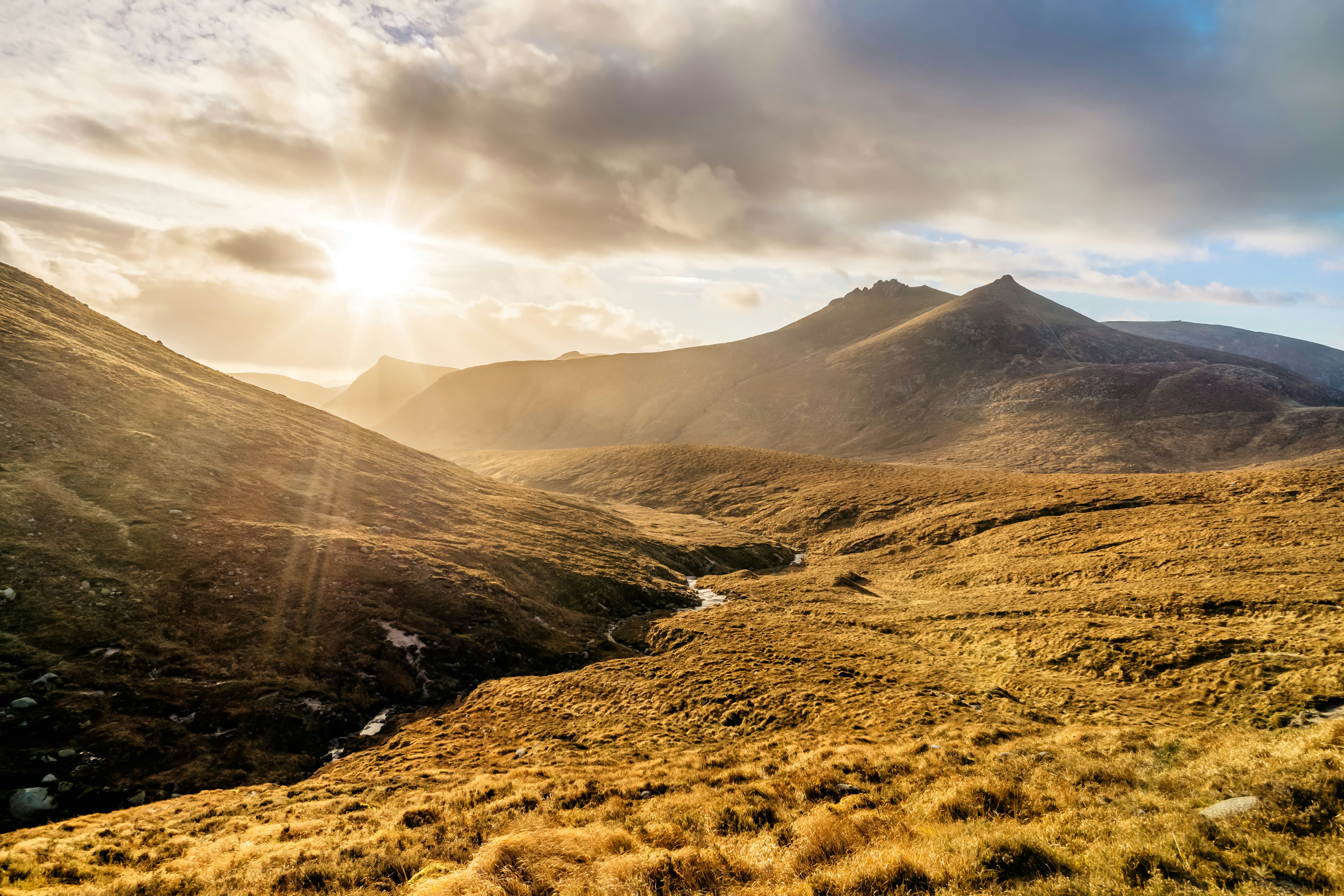 Sunset over autumn colored valley in the Mourne Mountains