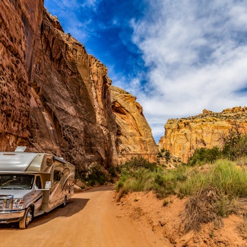 Capitol Reef, Utah, USA - 7 July 2019: Camper Van on Canyon scenic drive in Capitol Reef National Park, Utah, USA, License Type: media, Download Time: 2025-05-29T14:41:08.000Z, User: lonelyplanetmedia, Editorial: true, purchase_order: 65050 - Digital Destinations and Articles, job: Global Publishing WIP, client: Global Publishing WIP, other: Peterson Haggarty // SS Comp Ingestion
