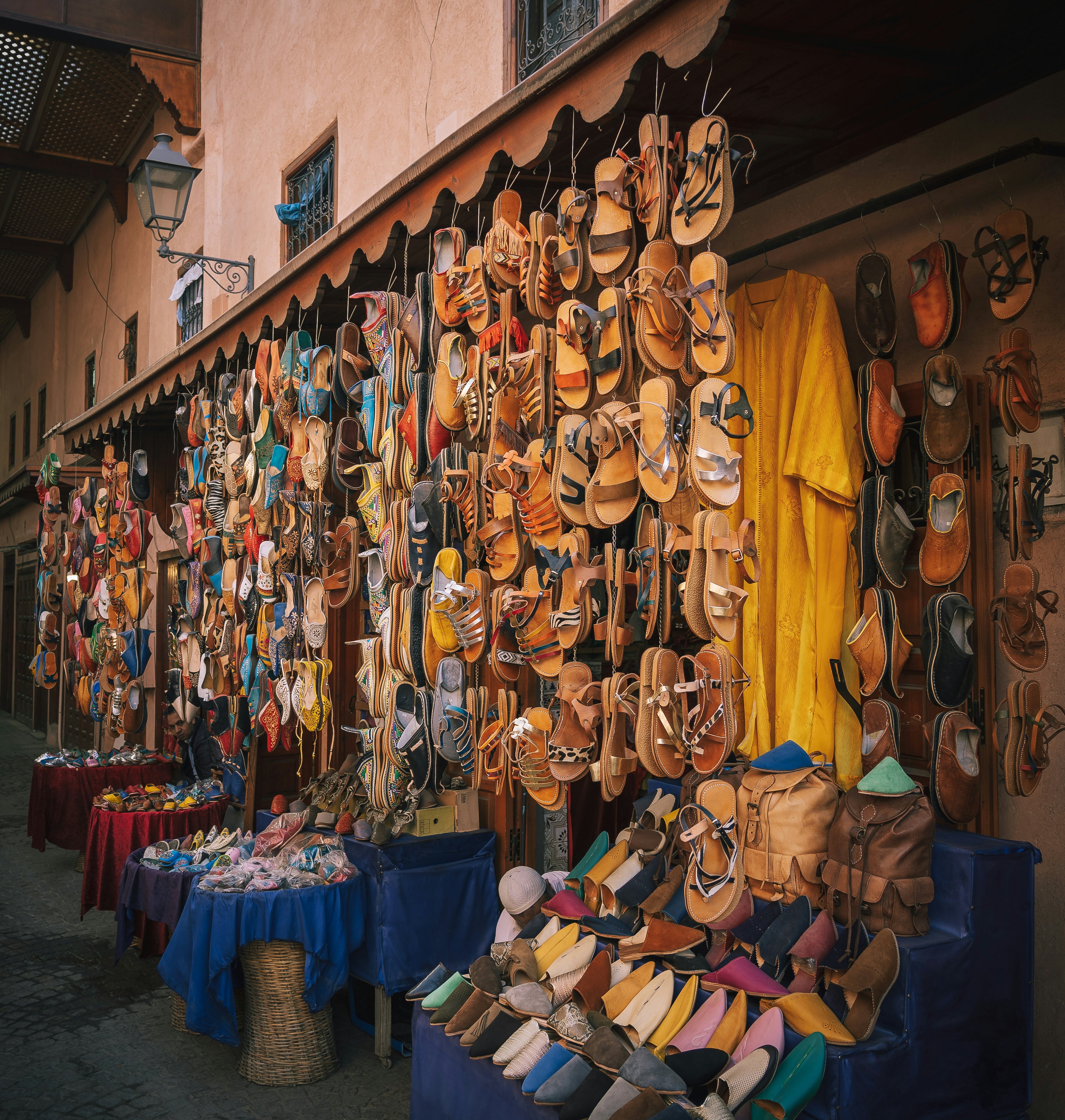 Colorful handmade leather slippers babouches on a market souk in the medina of Marrakech, Morocco