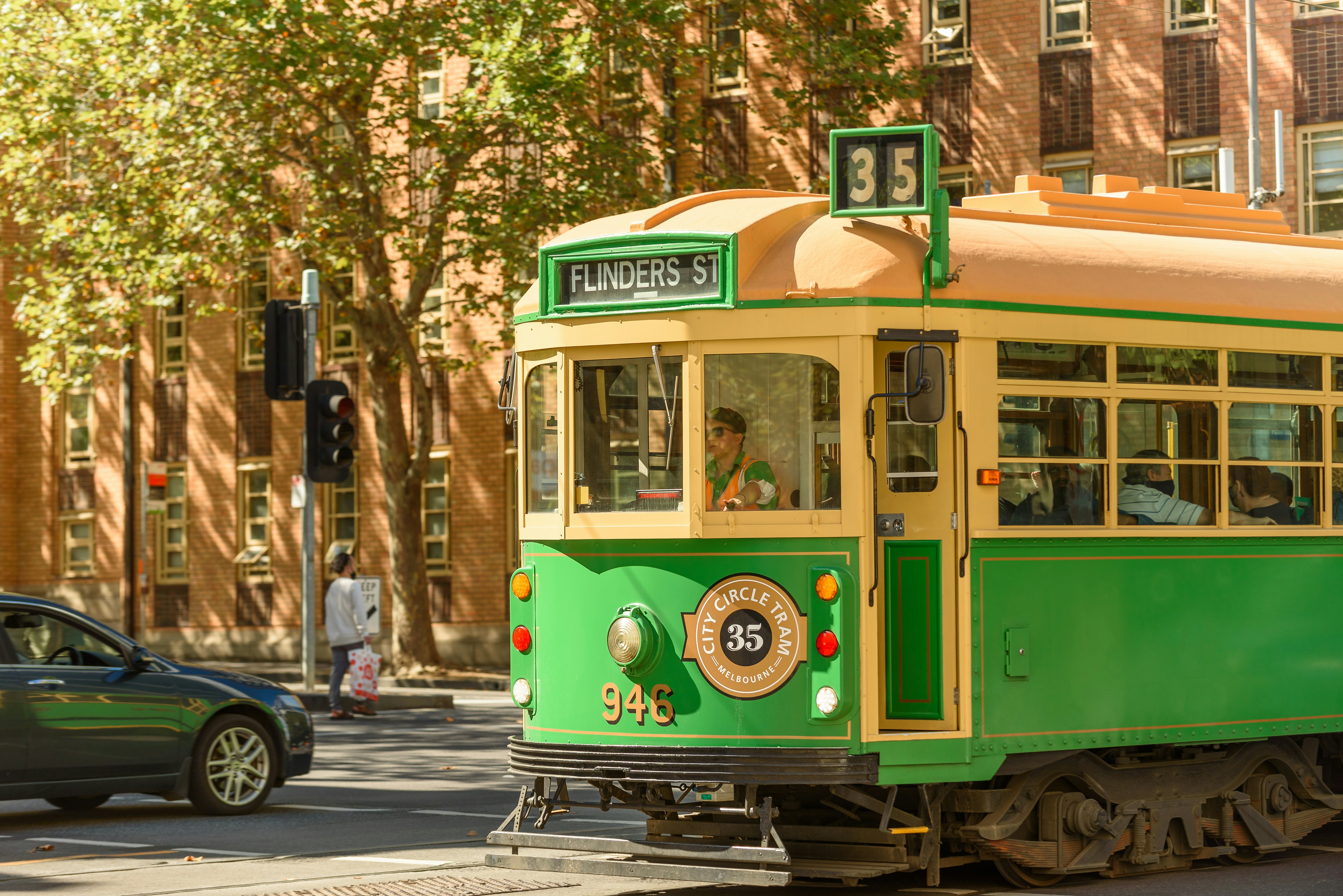 A vintage tram operating on Route 35 in central Melbourne.