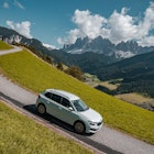 Dolomites, Italy - September, 2021: The white New Skoda Kamiq driving on the road with the mountain behind. Dolomite, Italy, summer. Roadtrip. , License Type: media, Download Time: 2025-11-05T20:26:56.000Z, User: bhealy950, Editorial: true, purchase_order: 65050 - Digital Destinations and Articles, job: Lonely Planet Online Editorial, client: Best road trips in Italy, other: Brian Healy