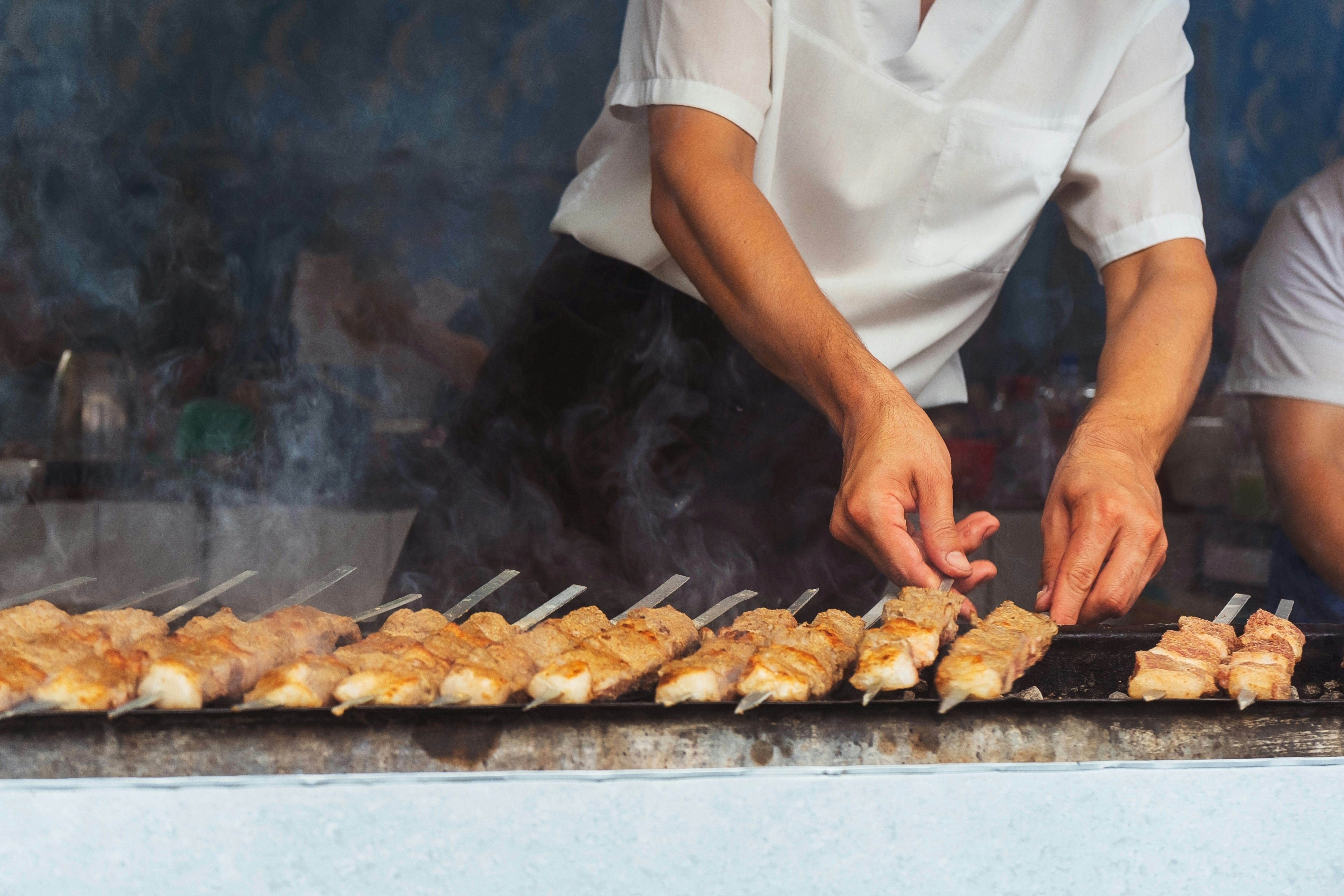 Shashlyk skewers grilling in Uzbekistan.
