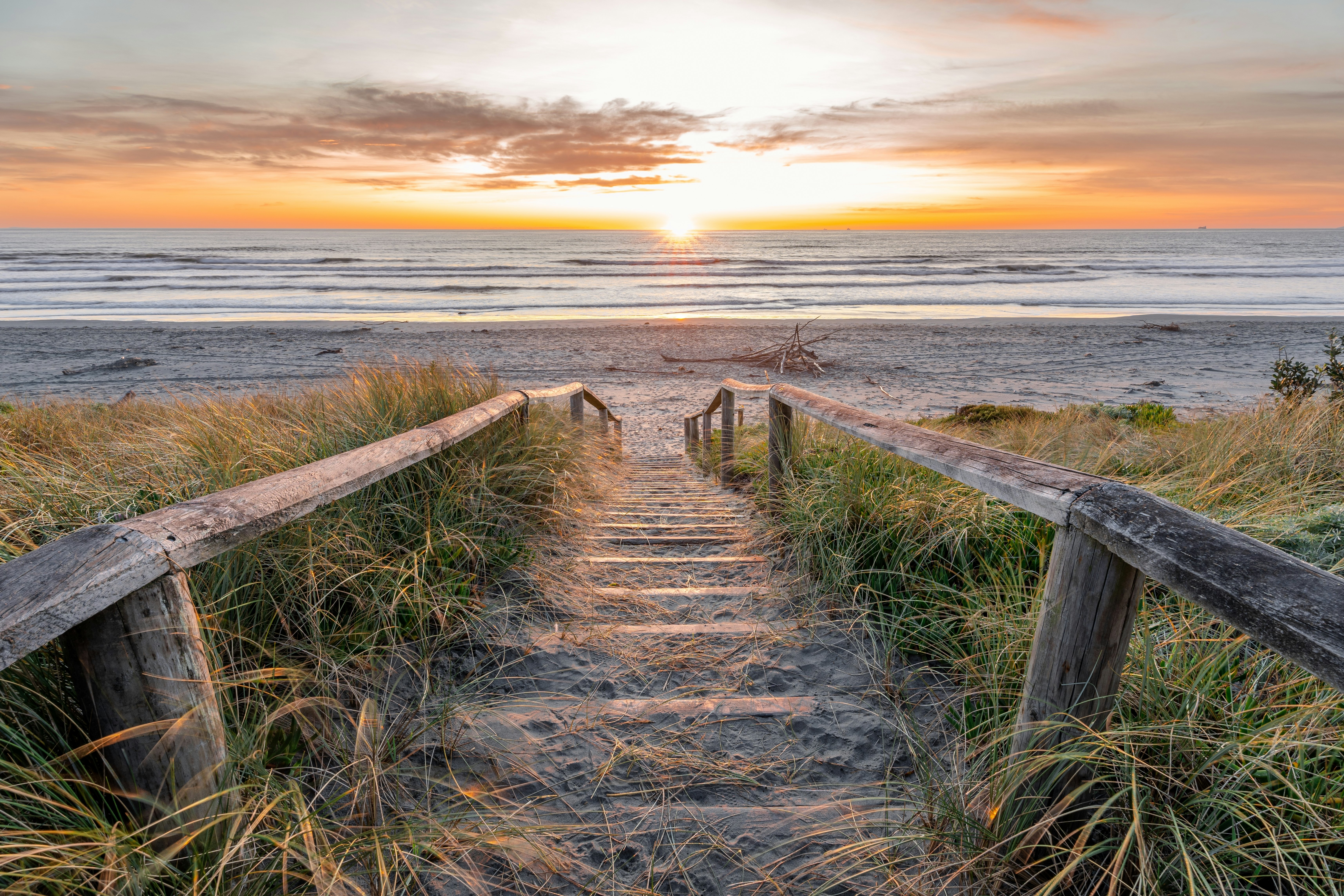 Beautiful sunrise at New Brighton Beach, Christchurch, New Zealand.