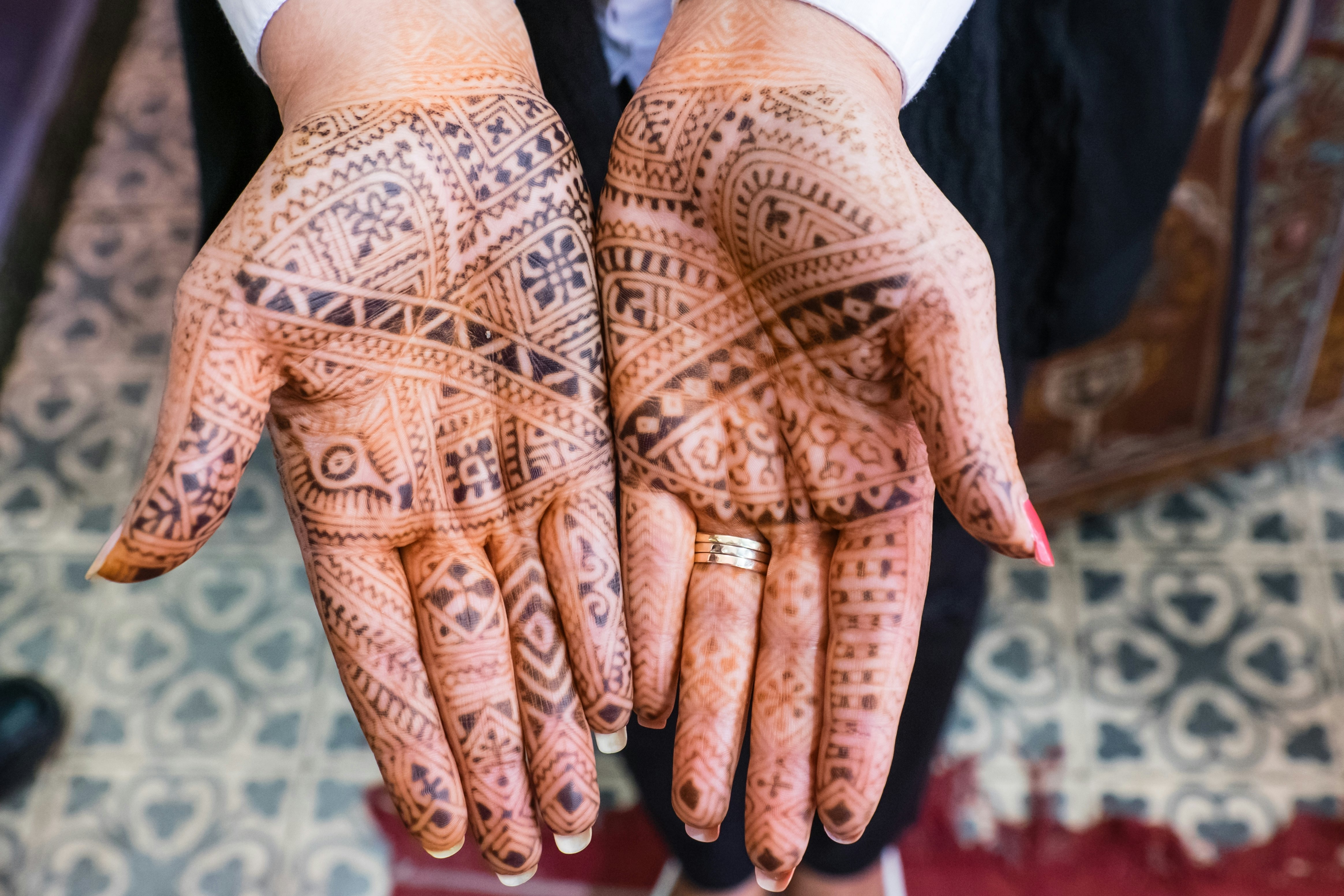 Temporary henna tattos on the hands of a woman in Marakkech.