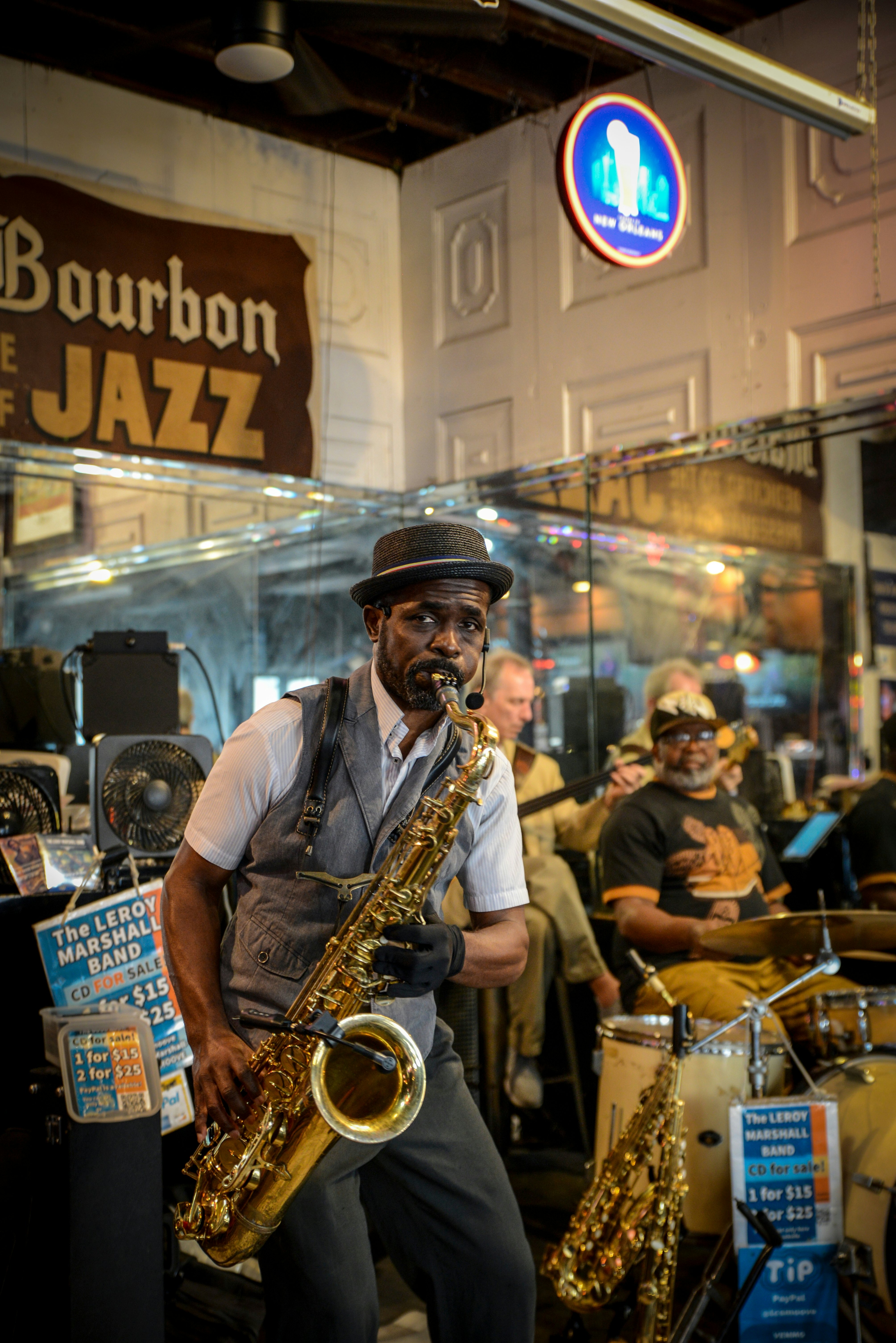 A man plays the jazz saxophone in a club on Bourbon Street in New Orleans, Louisiana.