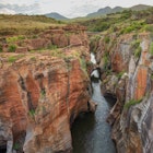 Rock formation in Bourke's Luck Potholes, Bridge over Bourke's Luck Potholes geological formation in the Blyde River Canyon area, Mpumalanga district, South Africa, License Type: media, Download Time: 2025-05-16T21:11:11.000Z, User: dogutierrez_redventures, Editorial: false, purchase_order: 65020 - Marketing or Sales - this includes sponsored articles, job: Elsewhere, client: Elsewhere, other: Dory G