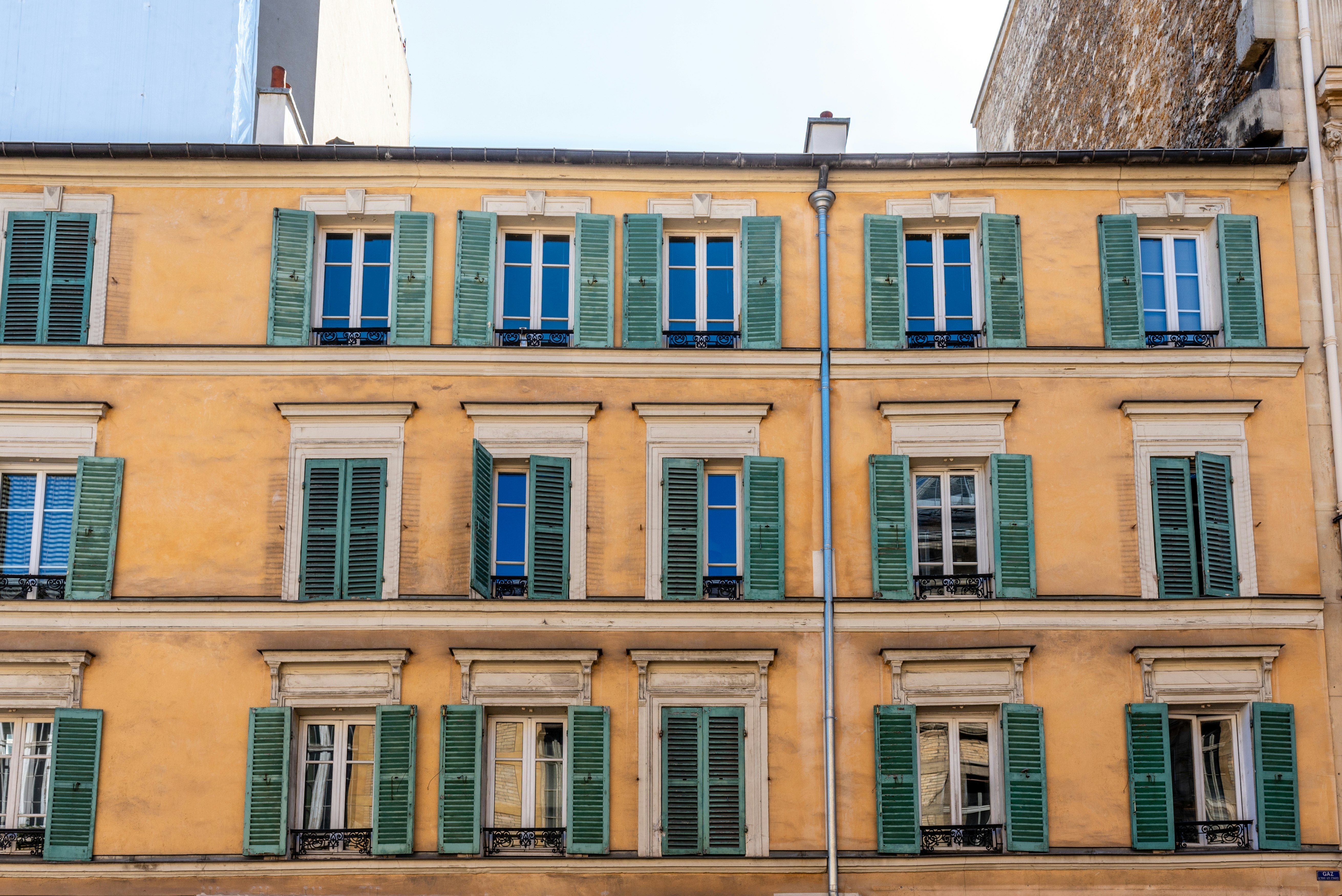 Old yellow residential building in the 15th arrondissement of Paris