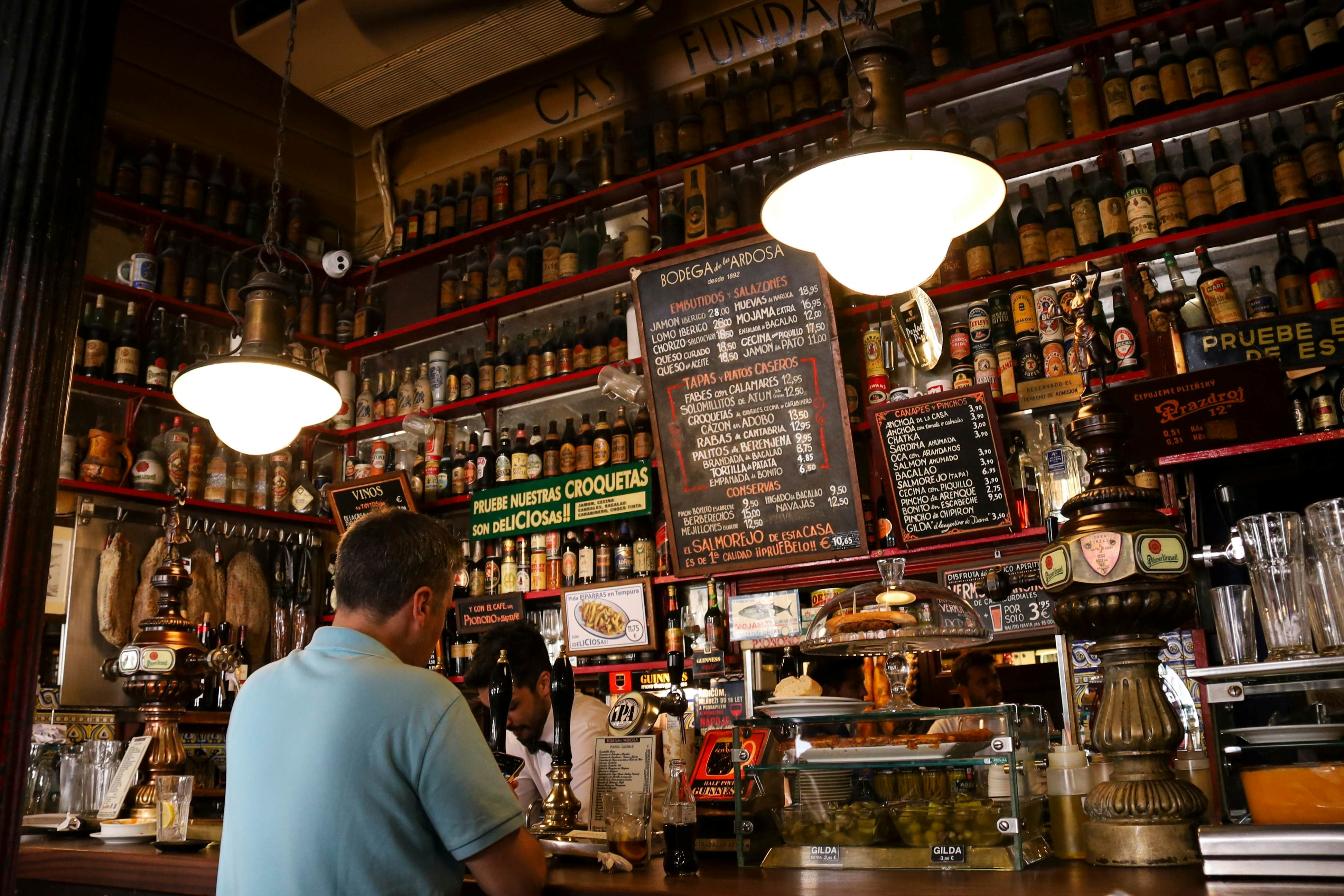 Madrid, Spain- March 7, 2019: Typical old spanish wine tavern called Bodega La Ardosa in Madrid city, License Type: media, Download Time: 2025-11-04T17:52:24.000Z, User: LP_NGMcElroy, Editorial: true, purchase_order: 65050 - Digital Destinations and Articles, job: Digital destinations content LP, client: Digital destinations content LP, other: Nicole McElroy