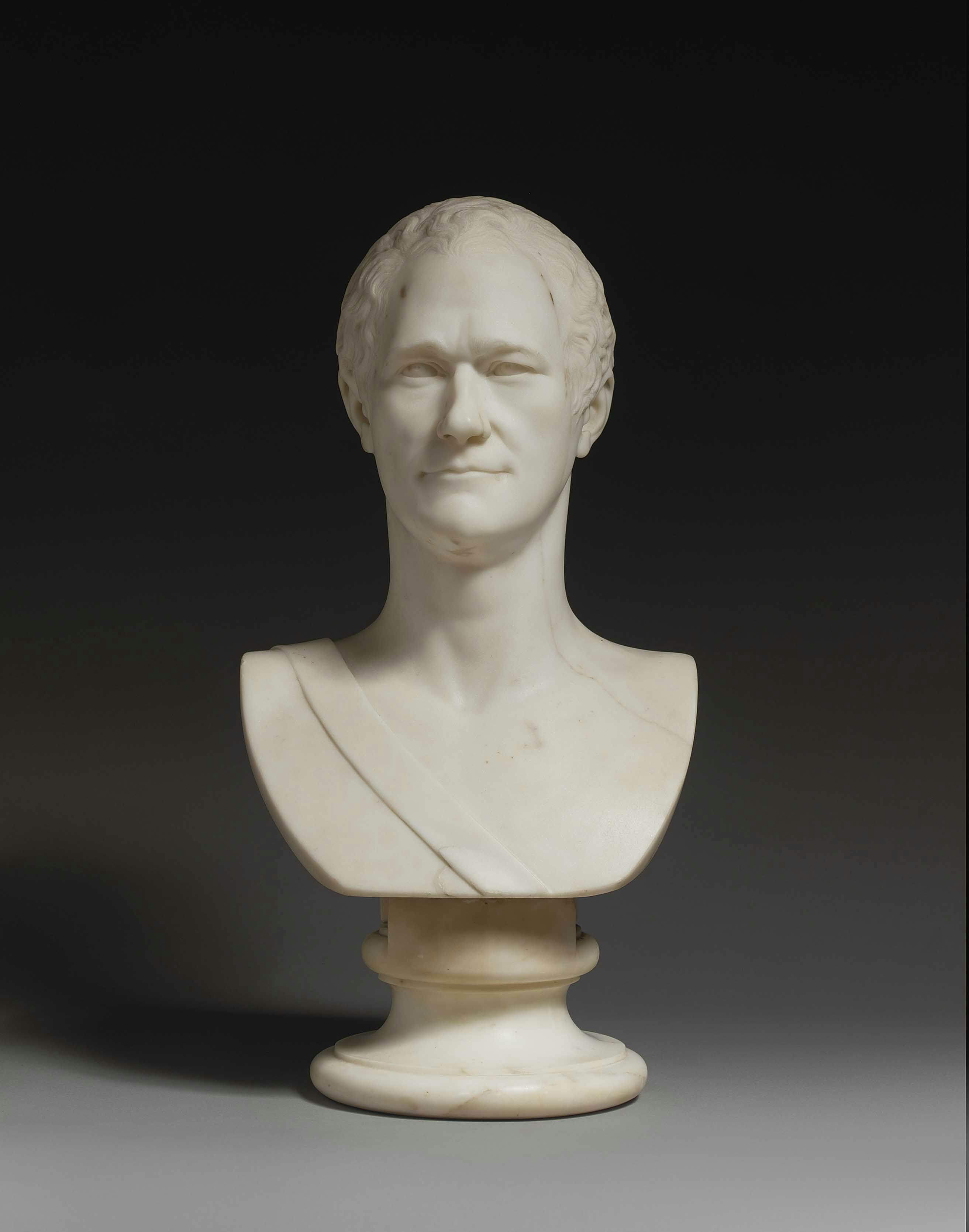 A marble bust of a heroic figure.