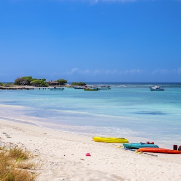 Kayaks on the white Rodgers Beach, located on the south coast of Aruba.
1164899899