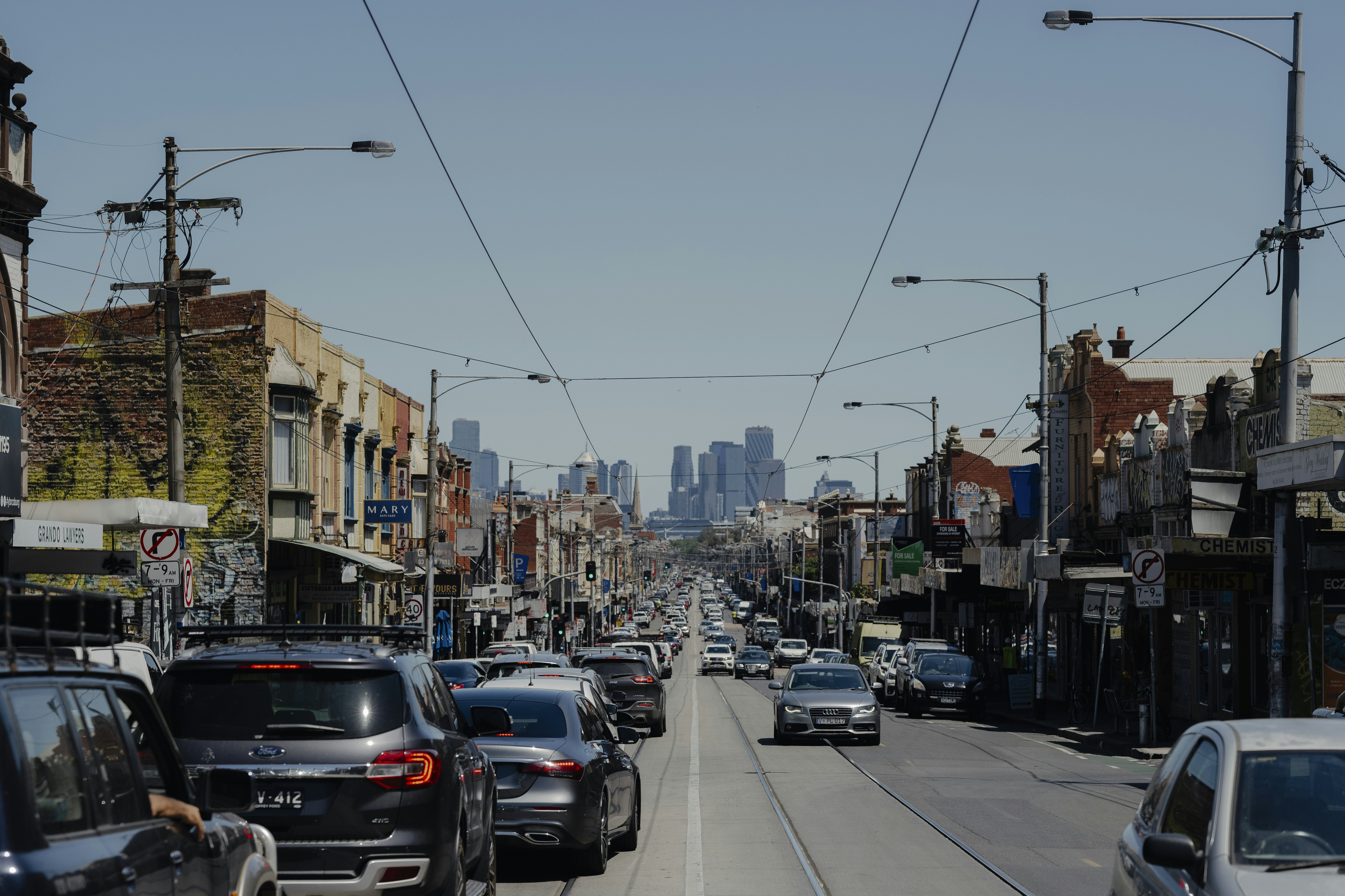 A neighborhood street in Melbourne clogged with traffic