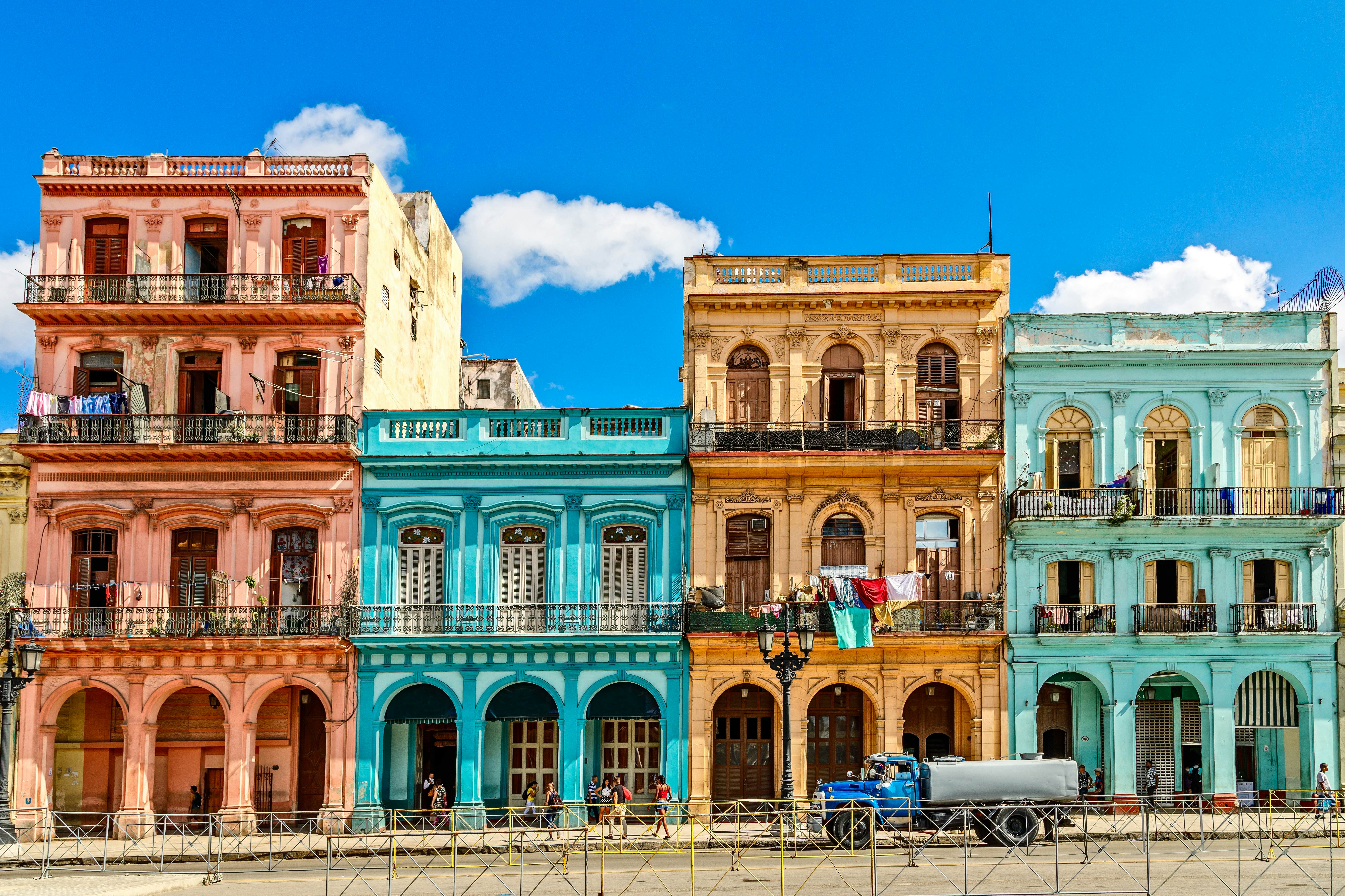Old living colorful houses across the road in the center of Havana, Cuba, License Type: media, Download Time: 2025-05-29T14:37:02.000Z, User: lonelyplanetmedia, Editorial: false, purchase_order: 65050 - Digital Destinations and Articles, job: Global Publishing WIP, client: Global Publishing WIP, other: Peterson Haggarty // SS Comp Ingestion
