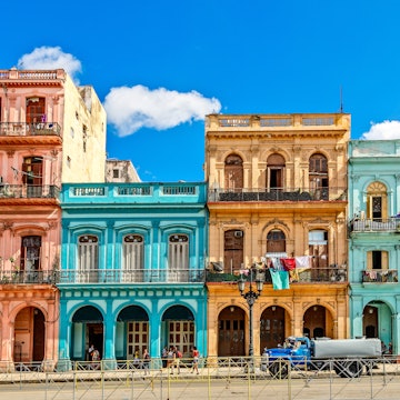 Old living colorful houses across the road in the center of Havana, Cuba, License Type: media, Download Time: 2025-05-29T14:37:02.000Z, User: lonelyplanetmedia, Editorial: false, purchase_order: 65050 - Digital Destinations and Articles, job: Global Publishing WIP, client: Global Publishing WIP, other: Peterson Haggarty // SS Comp Ingestion