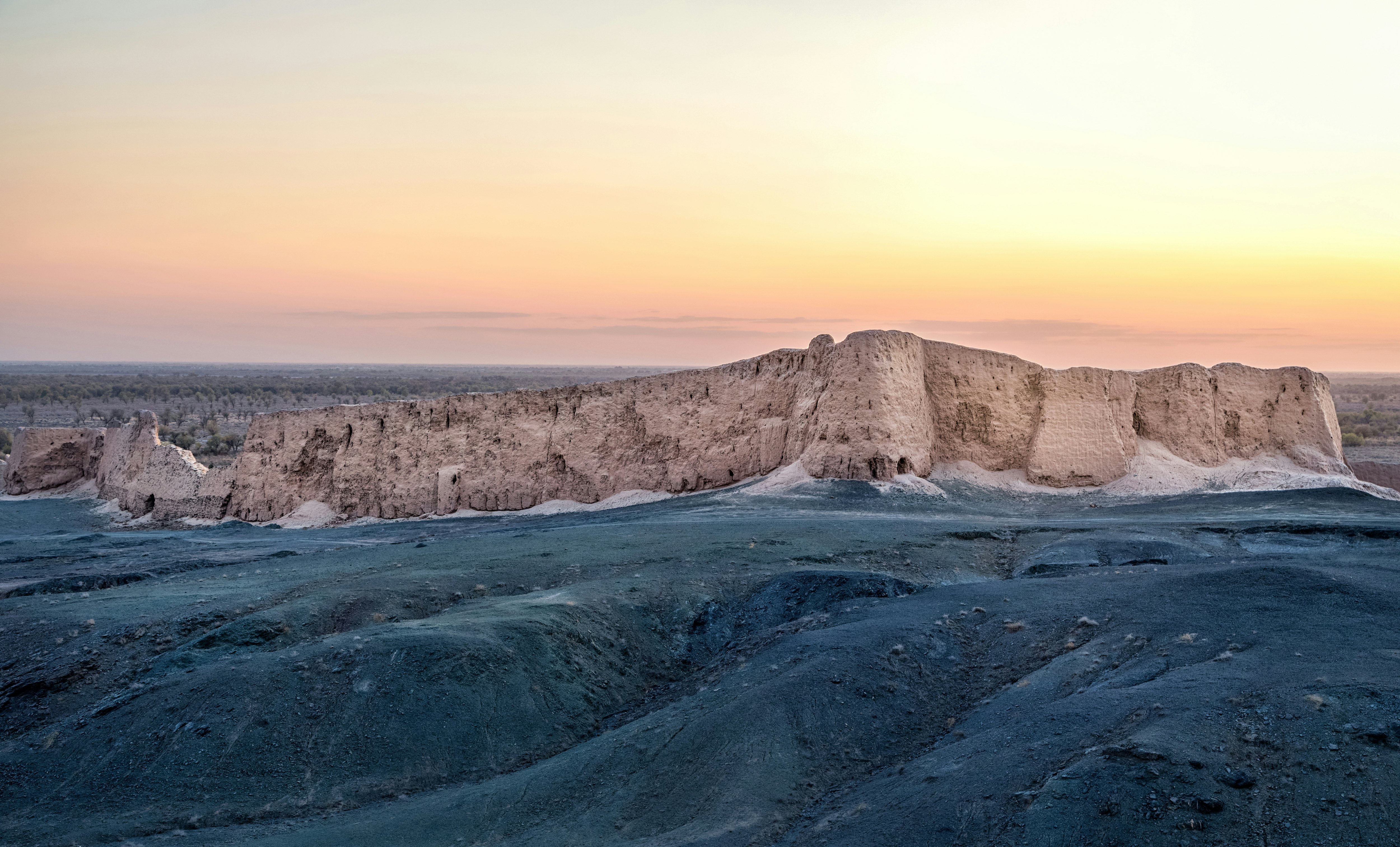 Wall of Djanpik Qala: 9-10th century Khorezm fotress on sunset, Karakalpakstan region, Uzbekistan.