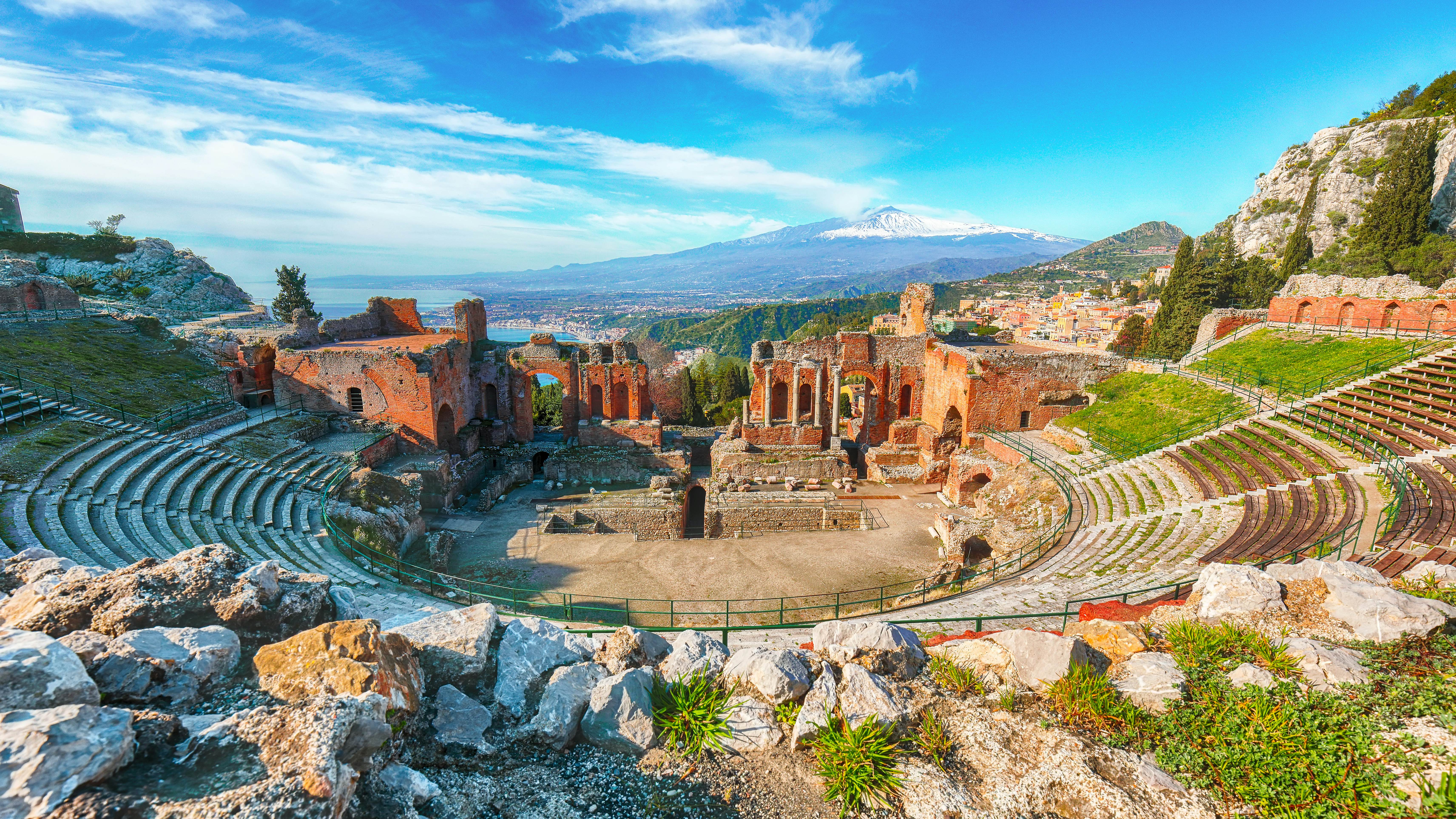 Ruins of ancient Greek theater in Taormina and Etna volcano in the background. Coast of Giardini-Naxos bay, Sicily, Italy, Europe., License Type: media, Download Time: 2025-12-01T16:26:37.000Z, User: dermothegarty77, Editorial: false, purchase_order: 56530 - Guidebooks, job: Global Publishing WIP, client: Western Europe 16, other: Dermot Hegarty