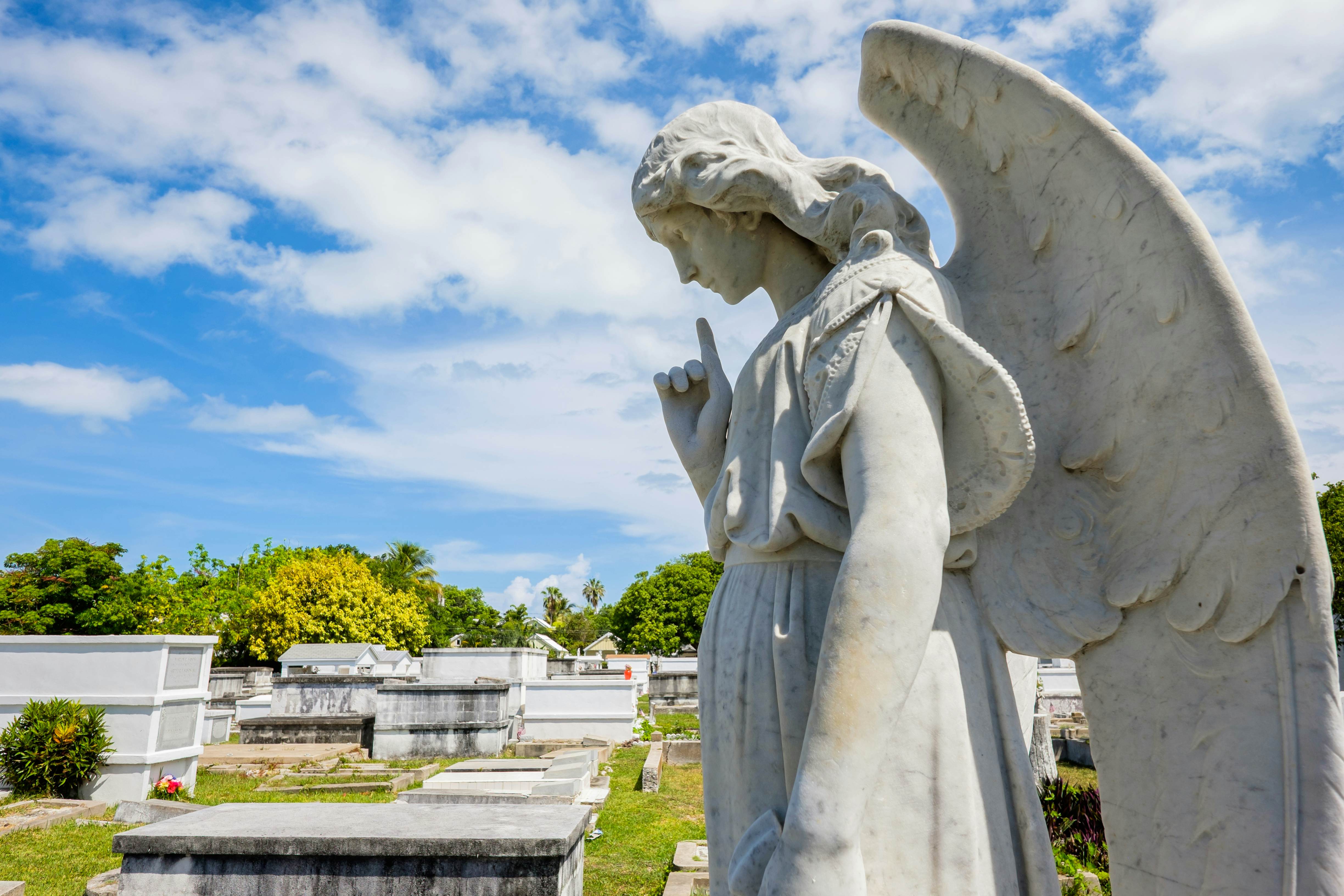 KEY WEST, FLORIDA USA - JUNE 26, 2014: Angel statue in the Key West Cemetery in the Historic District founded in 1847., License Type: media, Download Time: 2025-12-02T13:34:59.000Z, User: bhealy950, Editorial: true, purchase_order: 65050 - Digital Destinations and Articles, job: Lonely Planet Online Editorial, client: Best things to do in Key West, other: Brian Healy