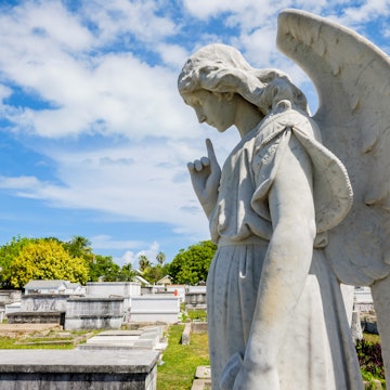 KEY WEST, FLORIDA USA - JUNE 26, 2014: Angel statue in the Key West Cemetery in the Historic District founded in 1847., License Type: media, Download Time: 2025-12-02T13:34:59.000Z, User: bhealy950, Editorial: true, purchase_order: 65050 - Digital Destinations and Articles, job: Lonely Planet Online Editorial, client: Best things to do in Key West, other: Brian Healy