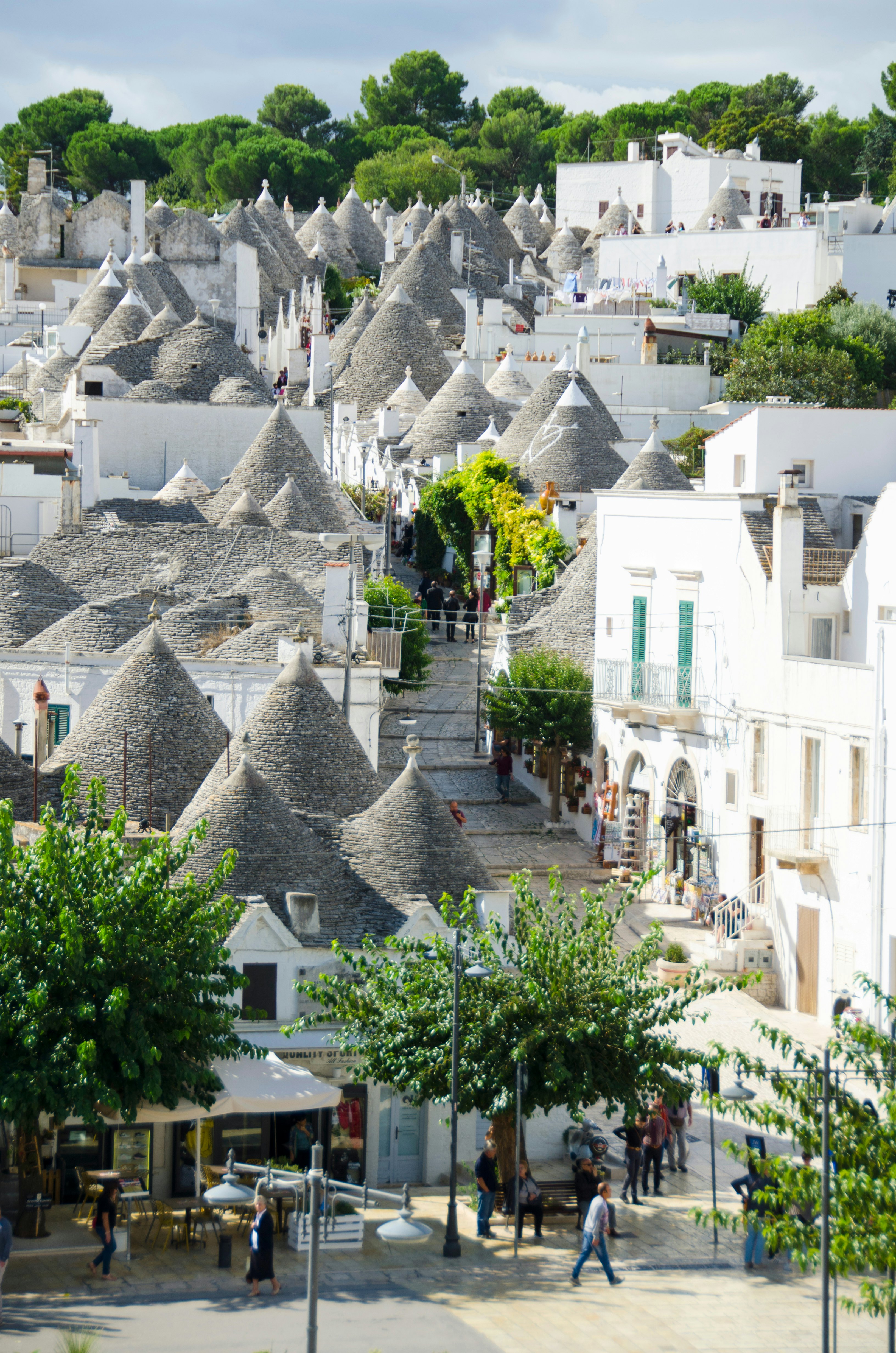 People strolling around Alberobello, the cultural capital of Valle d'Itria