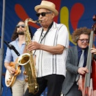 New Orleans, LA - April 26, 2024: New Orleans legend Charlie Gabriel performs at the Fairgrounds Race Track., License Type: media, Download Time: 2025-02-27T11:56:29.000Z, User: gwencotter, Editorial: true, purchase_order: 56530 - Guidebooks, job: Global Publishing-WIP, client: New Orleans 10, other: Gwen Cotter