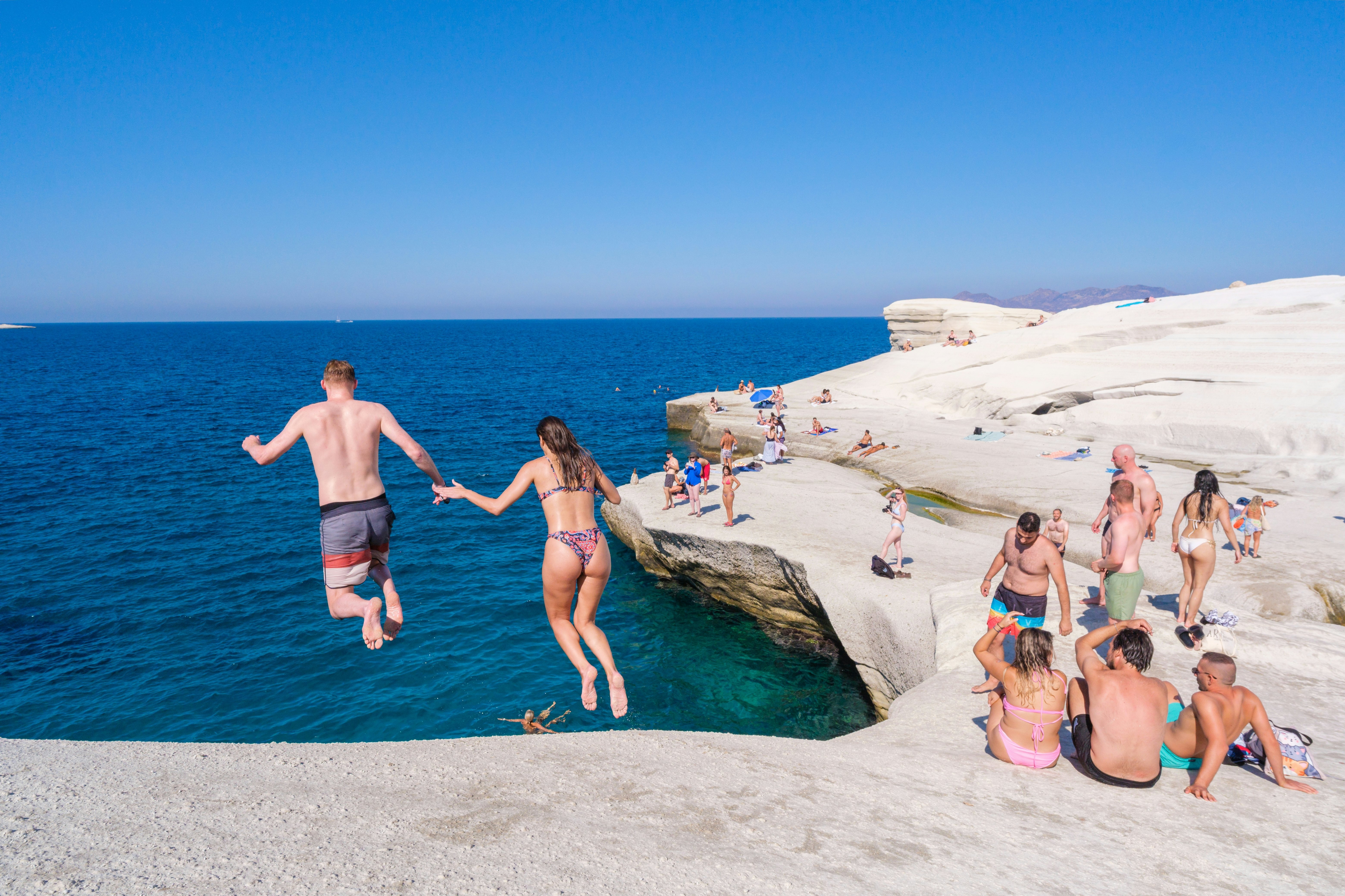 People diving at Sarakiniko beach