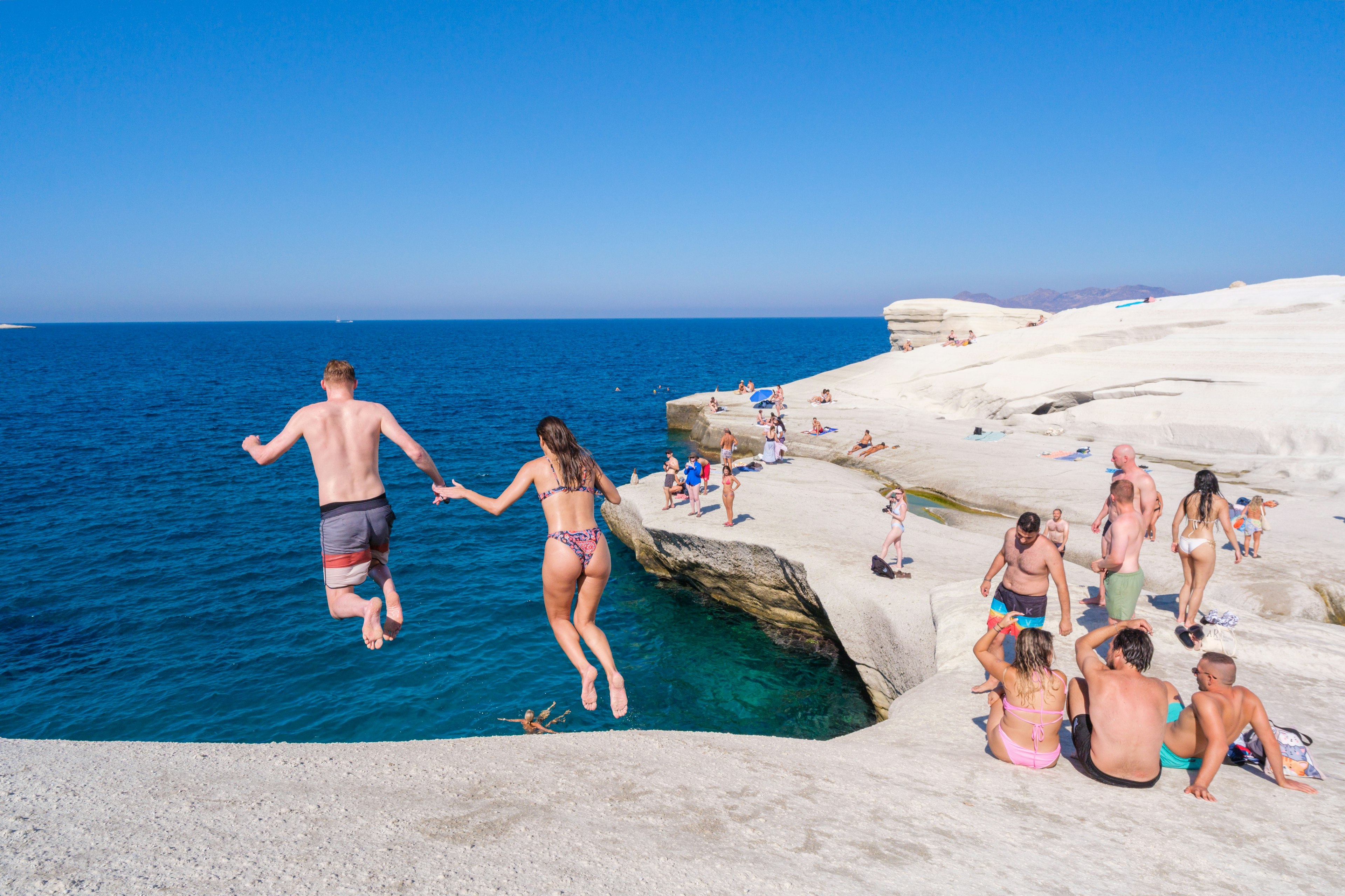 People diving at Sarakiniko beach