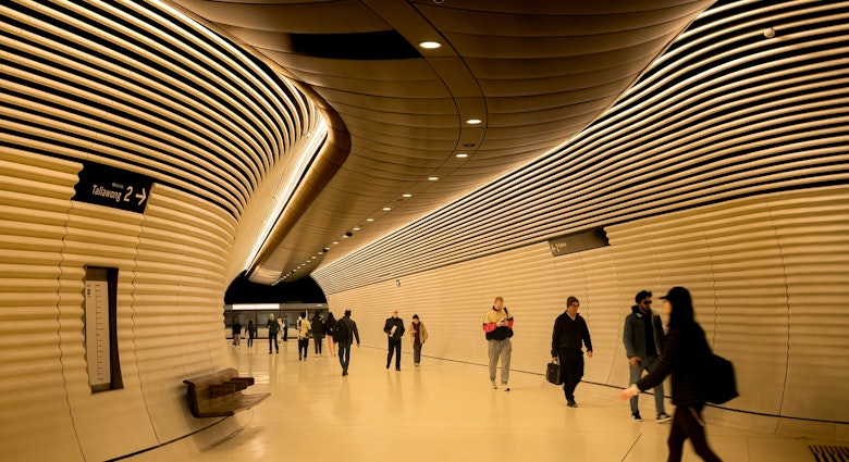 Sydney, NSW, Australia. July 16, 2025. Commuters heading along one of the concourses in the Gadigal metro station in Sydney; Shutterstock ID 2661691433; purchase_order:65050 - Digital Destinations and Articles; job:Lonely Planet; client:How to get around in Sydney; other:Sasha Brady
2661691433