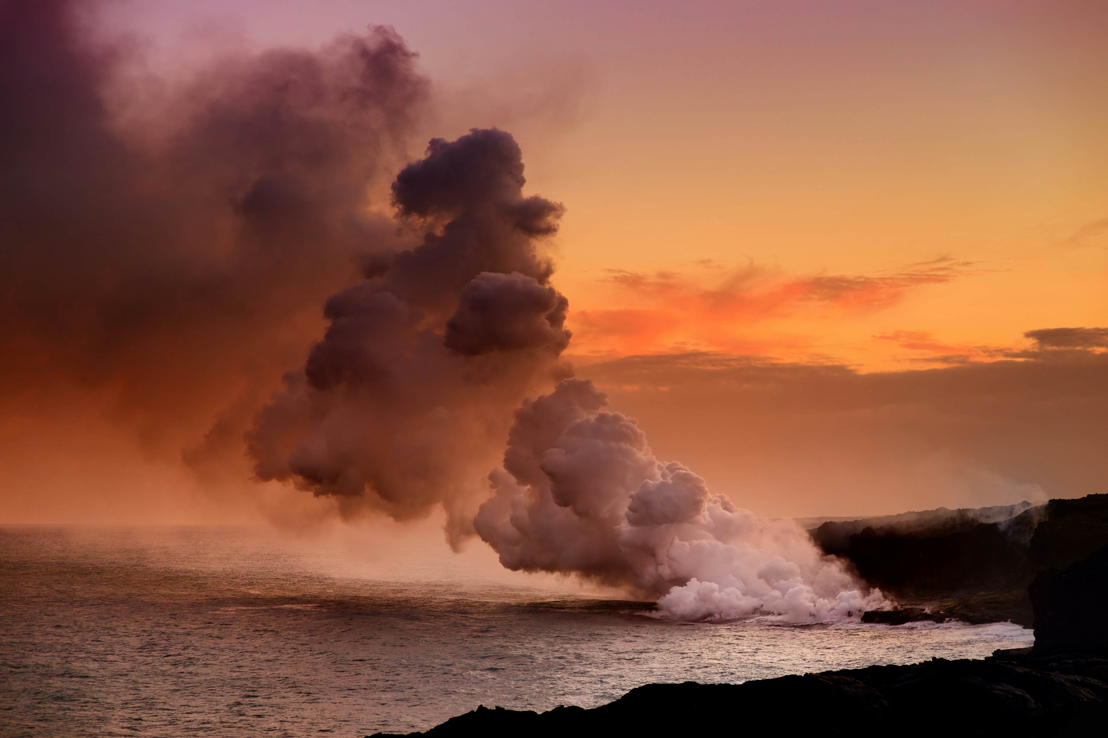 Lava pouring into the ocean creating a huge poisonous plume of smoke at Hawaii's Kilauea Volcano, Volcanoes National Park, Big Island of Hawaii, License Type: media, Download Time: 2025-11-14T17:18:22.000Z, User: rhylton_redventures, Editorial: false, purchase_order: 65050 - Digital Destinations and Articles, job: Lonely Planet, client: dream trips, other: Rhianydd Hylton
