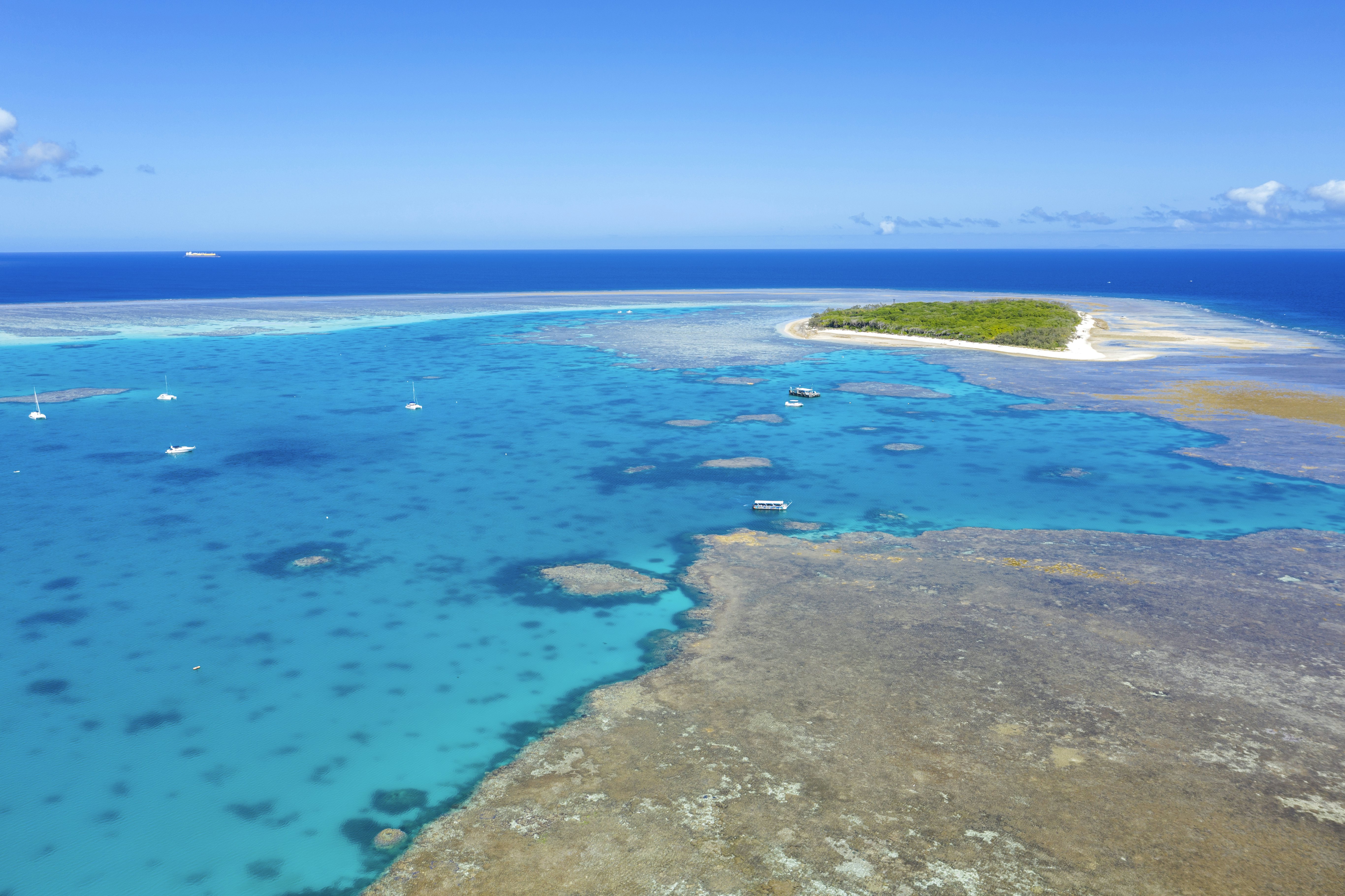 Aerial view over the blue water of the great Barrier Reef